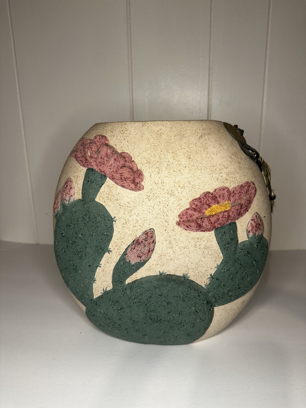 Two southwestern sand vases on large and one medium size
