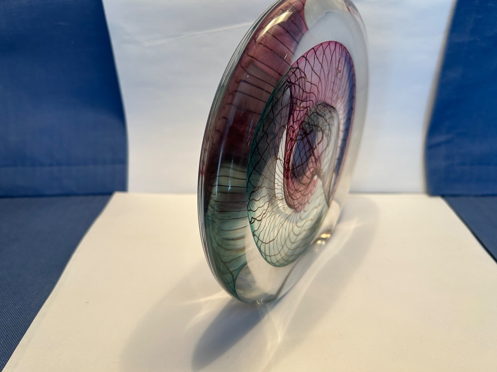 SIGNED ART GLASS FROM THE 1990S WITH PURPLE, GREENS AND LIGHT BROWN VEINING