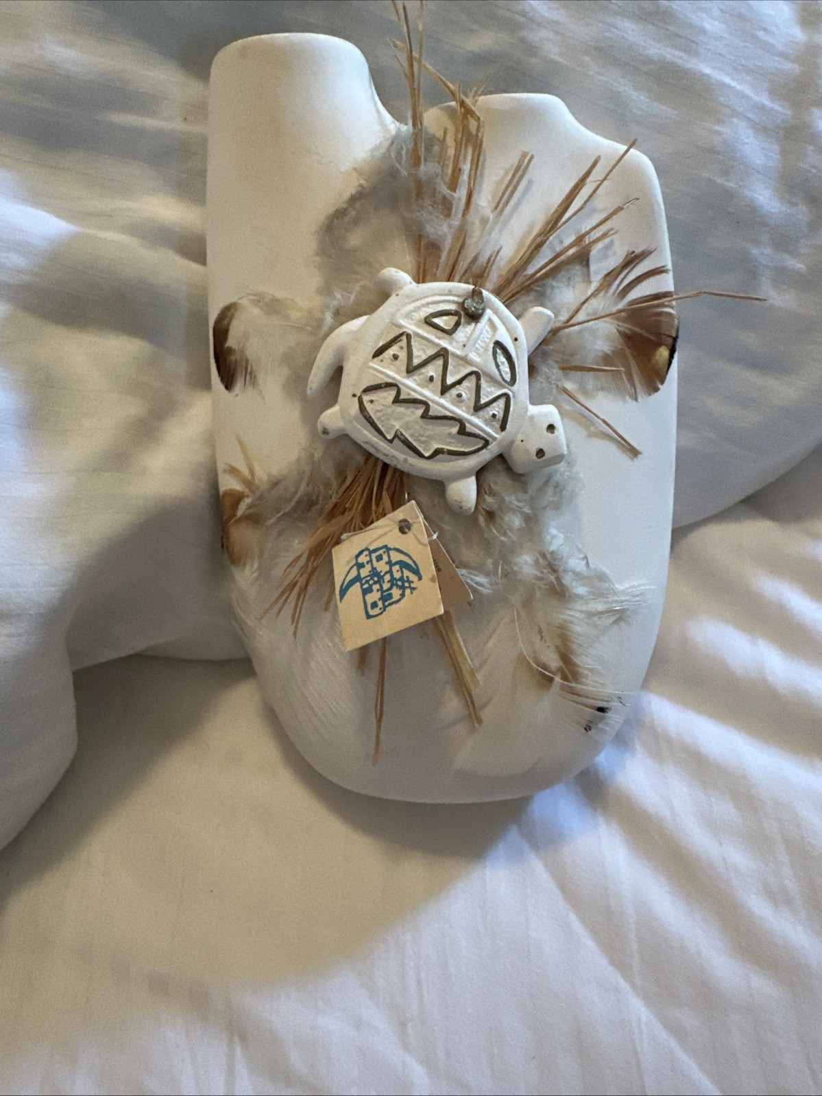 Adobe Moon white Double Spout vase W/central turtle ornament, feathers And Straw