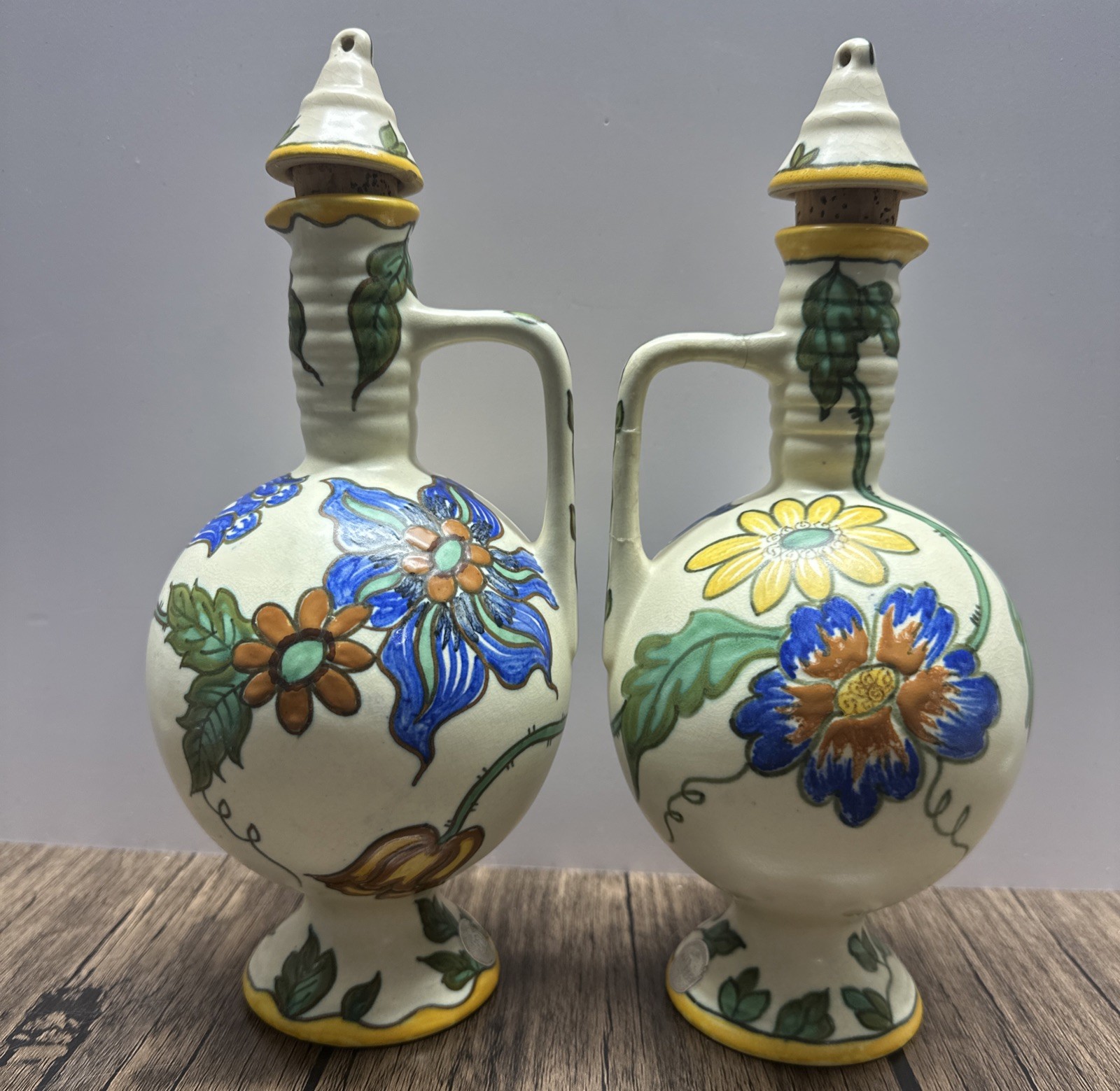 **ROYAL ZUID-HOLLAND GOUDA** VTG Pair 10.5” ‘Wilany’ Hand Painted Floral Ewers