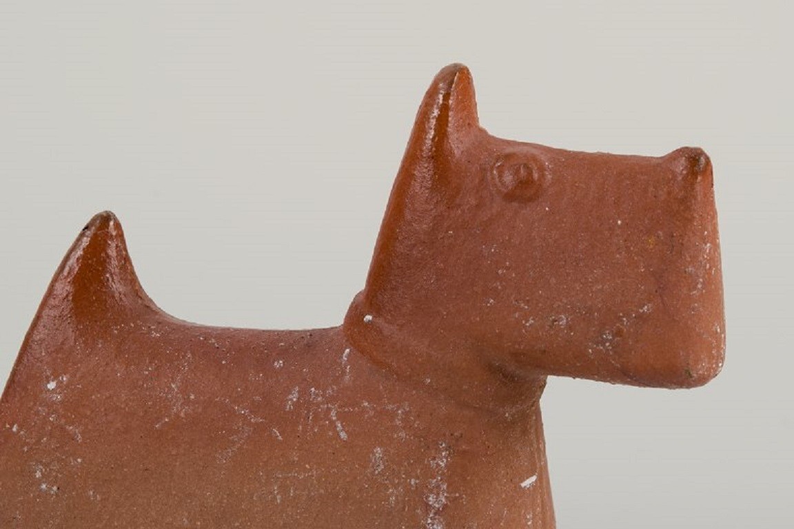 Stig Lindberg (1916-1982), three “Scotty” dogs in stoneware for Gustavsberg.