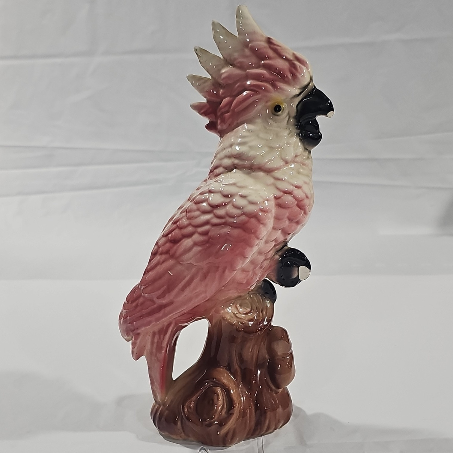 Pink & White Ceramic Cockatoo Figurine on Brown Tree Stump Base, Glossy