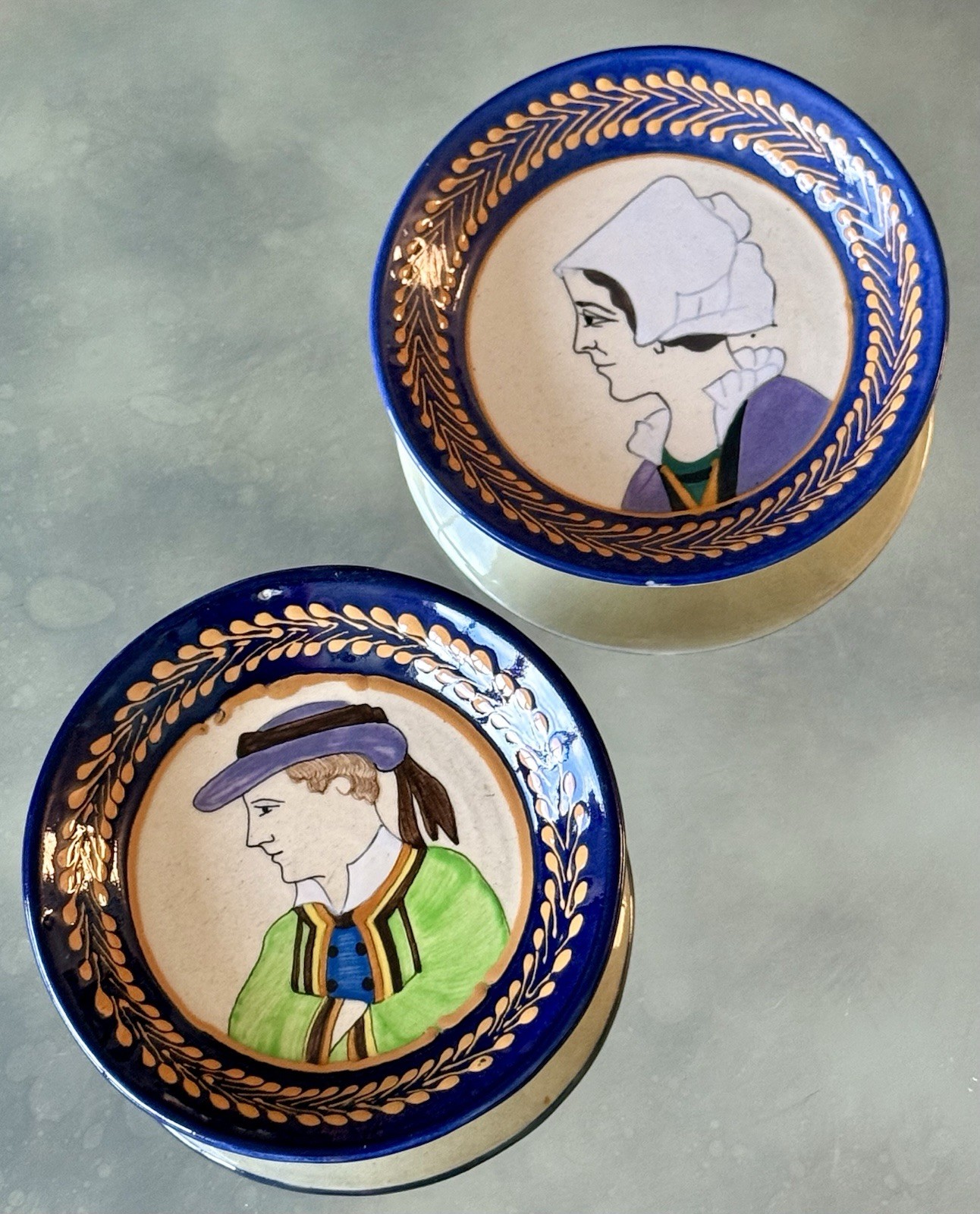 Two Hand-Painted Quimper Breton Faience Portrait Plates Circa 1930. Signed HB.