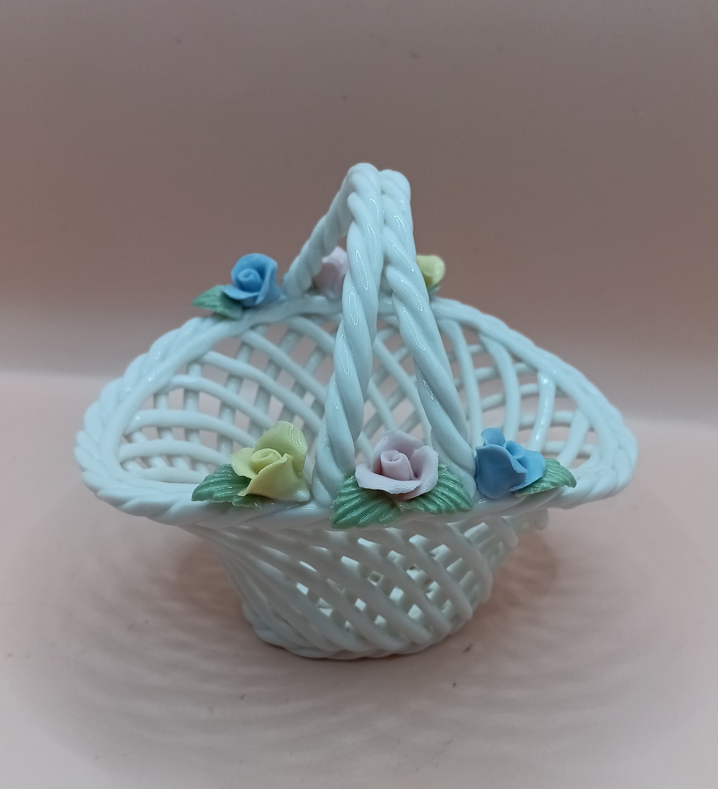 White Ceramic Woven Basket with Yellow, Pink, and Blue Rose Flowers