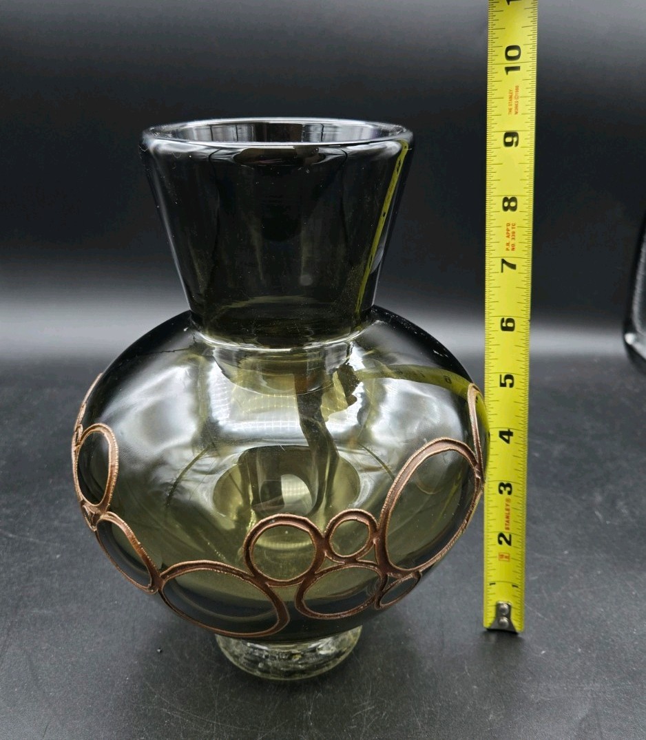 A Beautiful Green Art Glass Vase with Copper Electroform circle design.