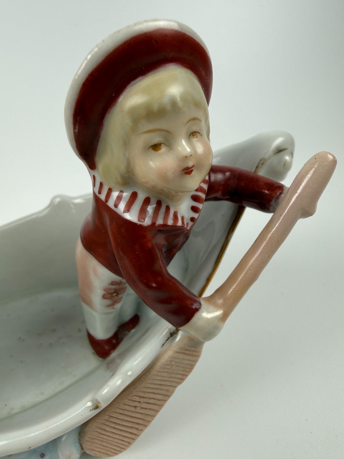 Antique Germany Conta Boehme Porcelain Match holder bud vase boy boat figurine