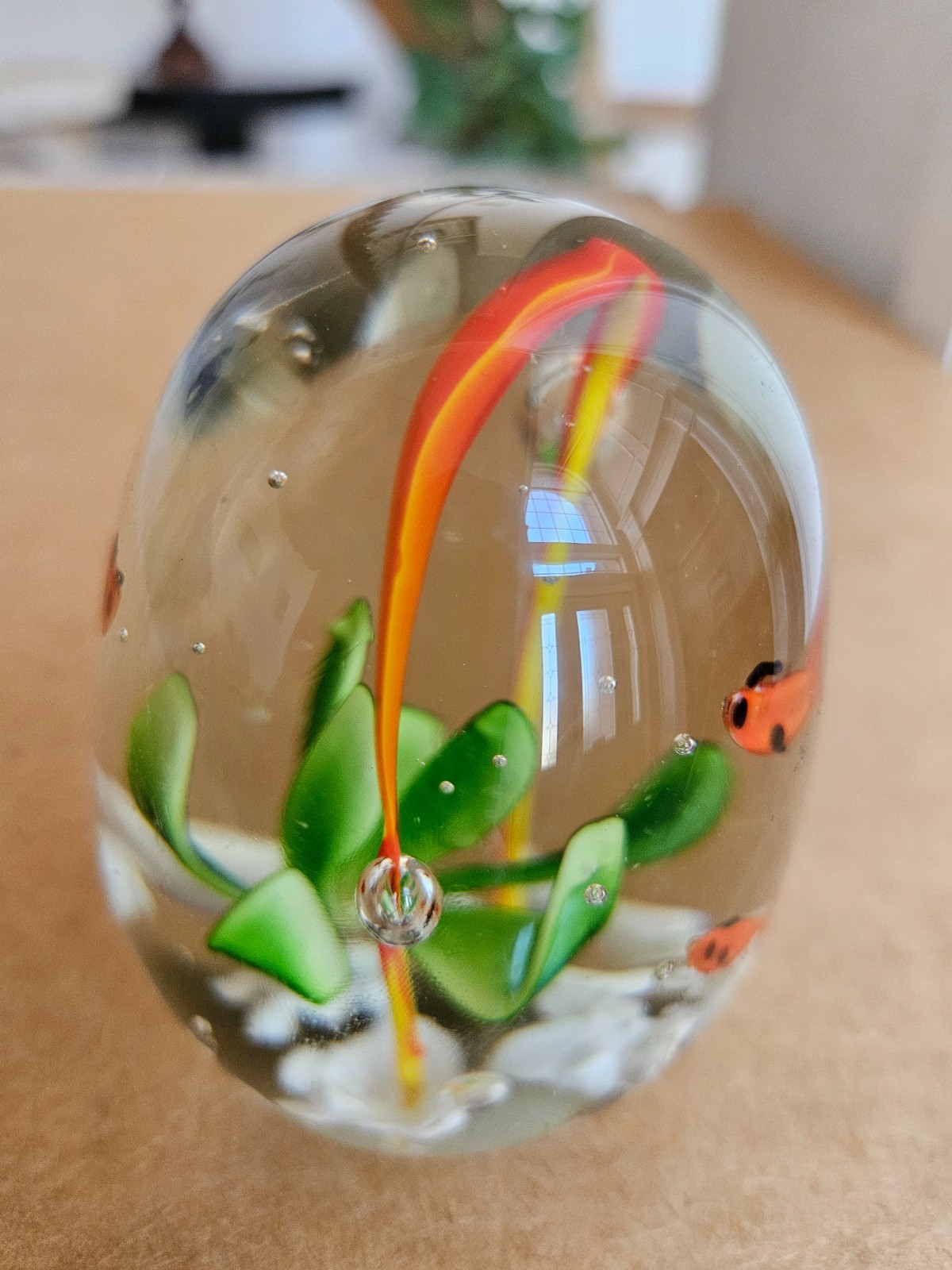 GLASS EGG SHAPE PAPERWEIGHT ORANGE FISH INSIDE GREEN FLOWER