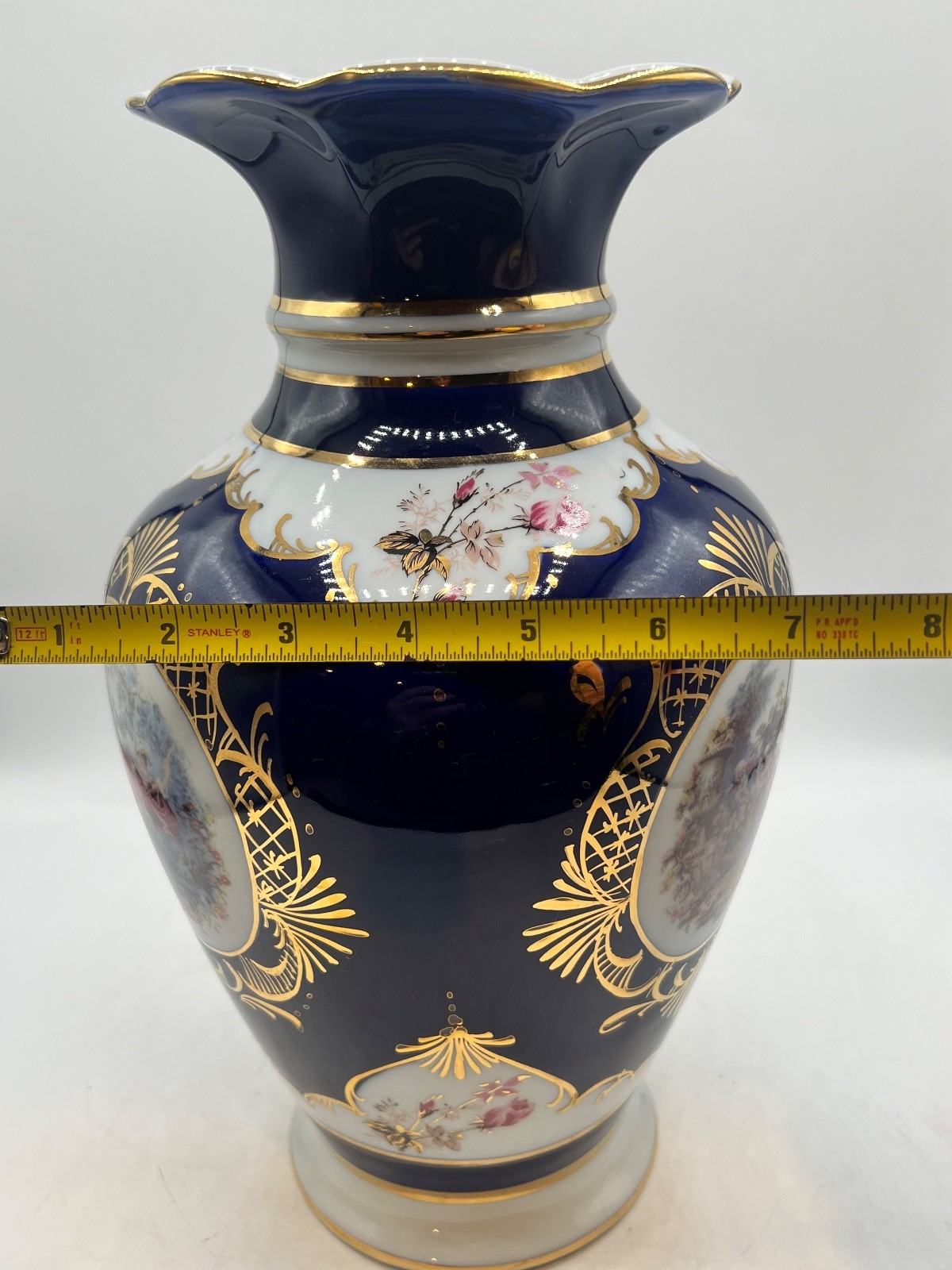 Fine Egyption porcelain vase with cobalt blue,gold,gilt, and pastoral scenes