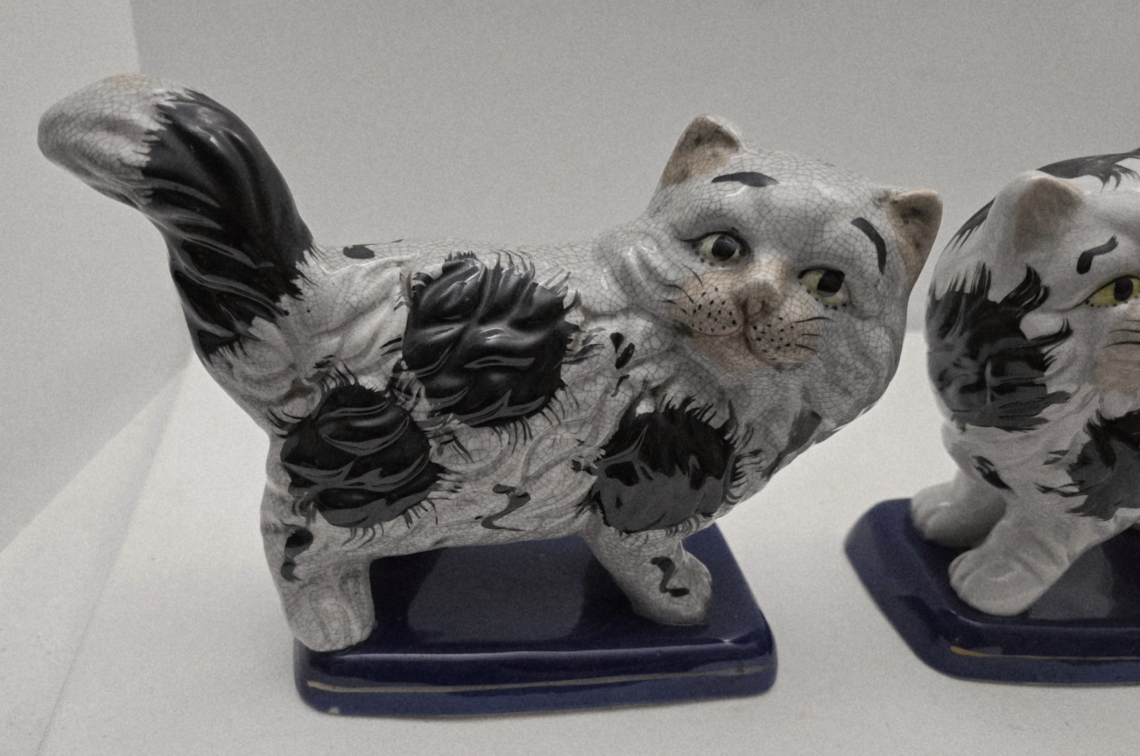Pair of Vintage Black and White Staffordshire Style Cats on Blue Bases Porcelain
