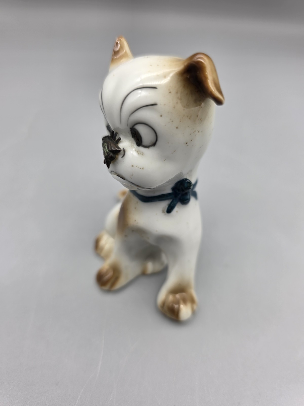Vintage Porcelain Puppy Dog Figurine W Fly on Nose Brown Speckled Germany #5562