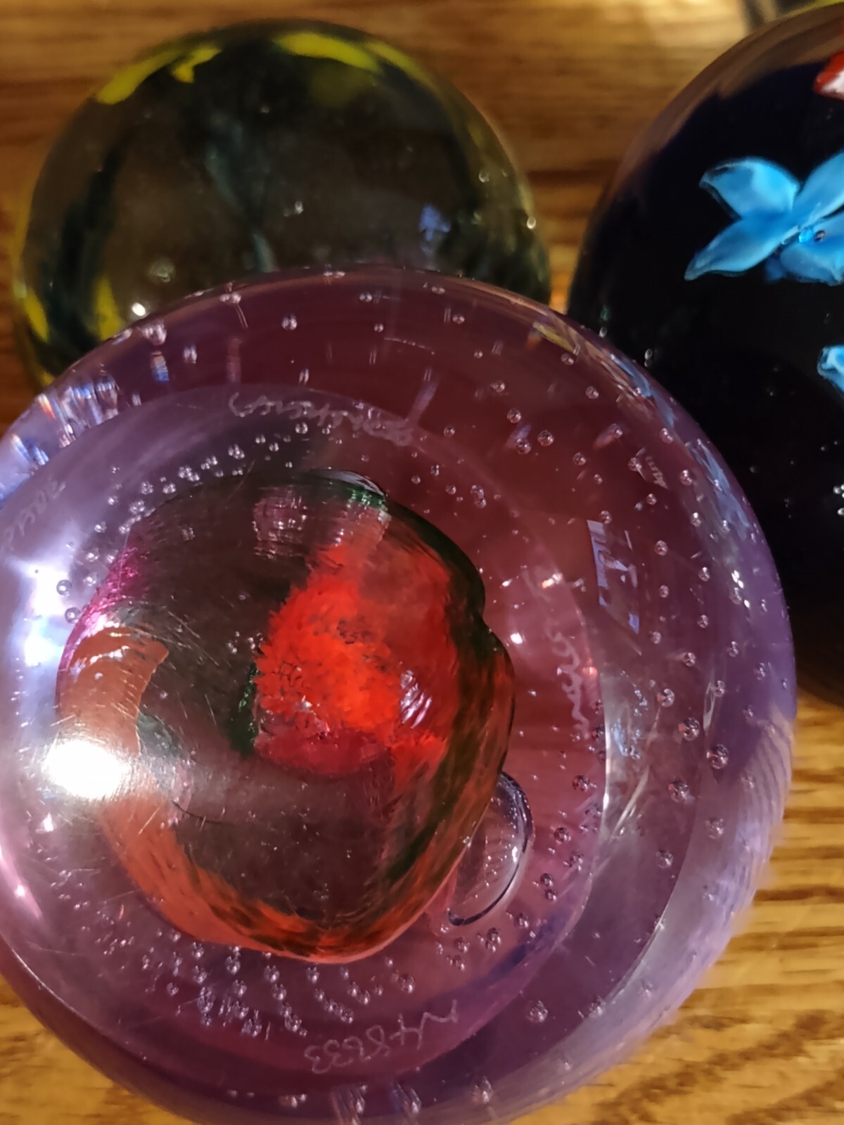 5 different beautiful hand blown art glass Crystal paperweights.