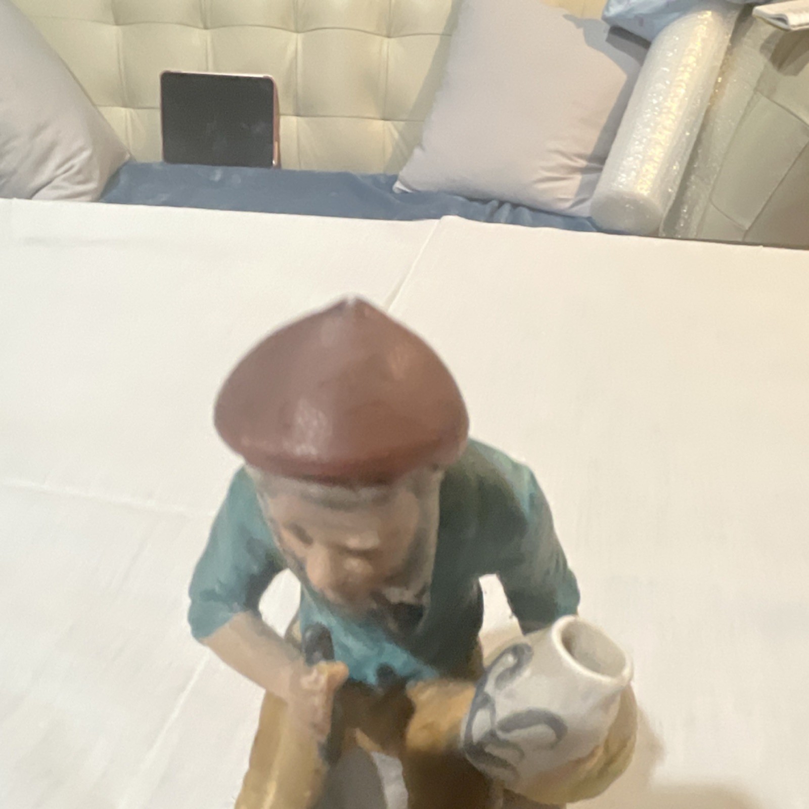 Ceramic Multicolor Glossy Decorative Figurine of Man with Jug People Theme