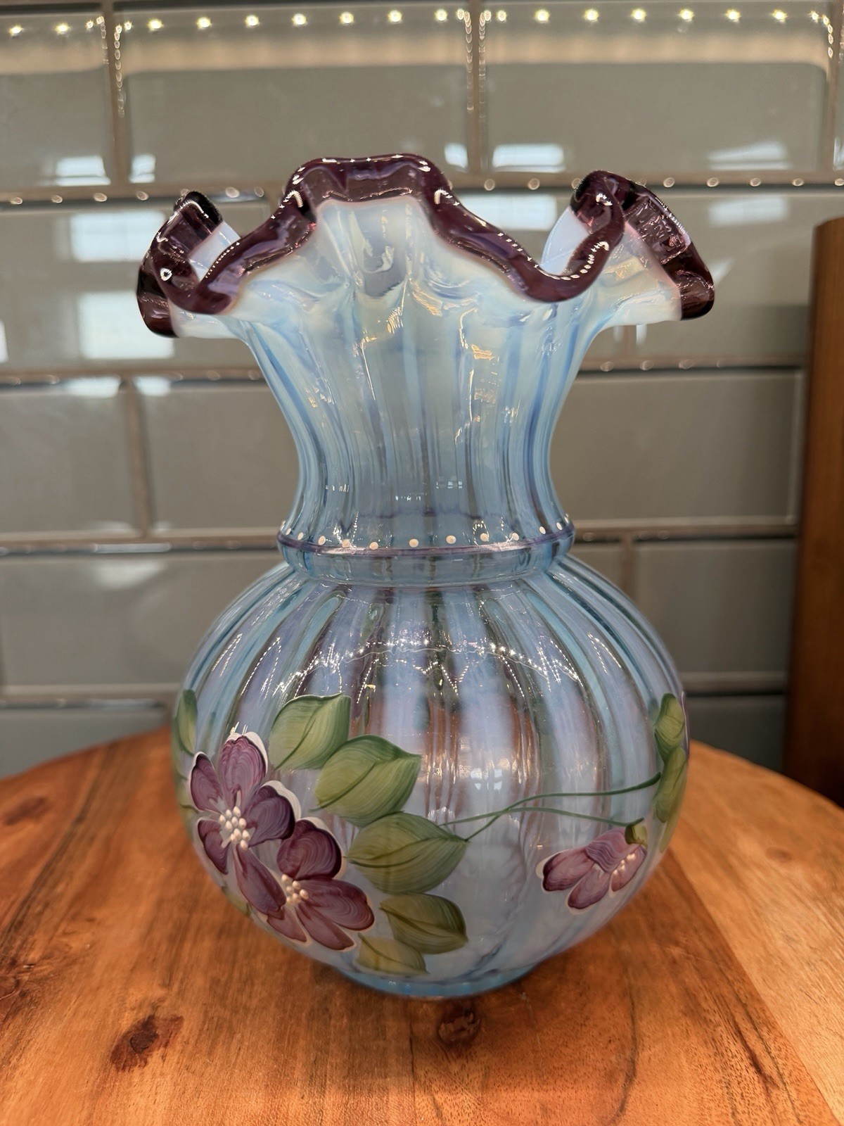 Fenton Art Glass “Misty Blue Rib Optic Vase” ruffled plum/mulberry edge (glows)