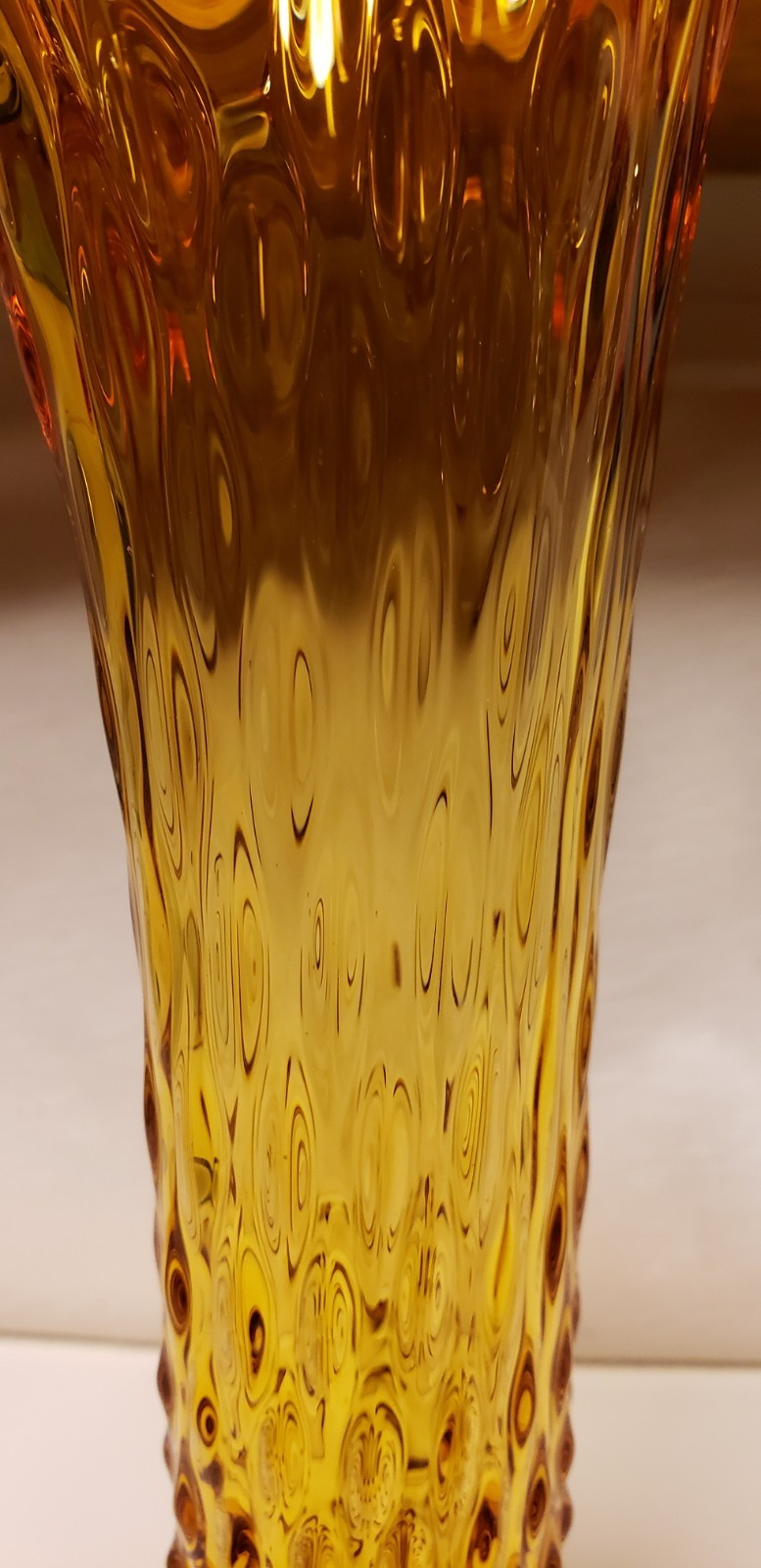Hobnail Pattern Stretch Glass Vase. Amber Pedestal Bottom Glass Vase. 14″ High.