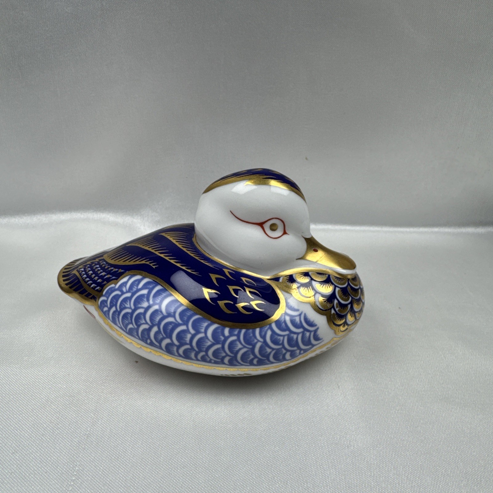 Royal Crown Derby Imari Duck Blue, White, Red, Gold Paperweight – Gold Button