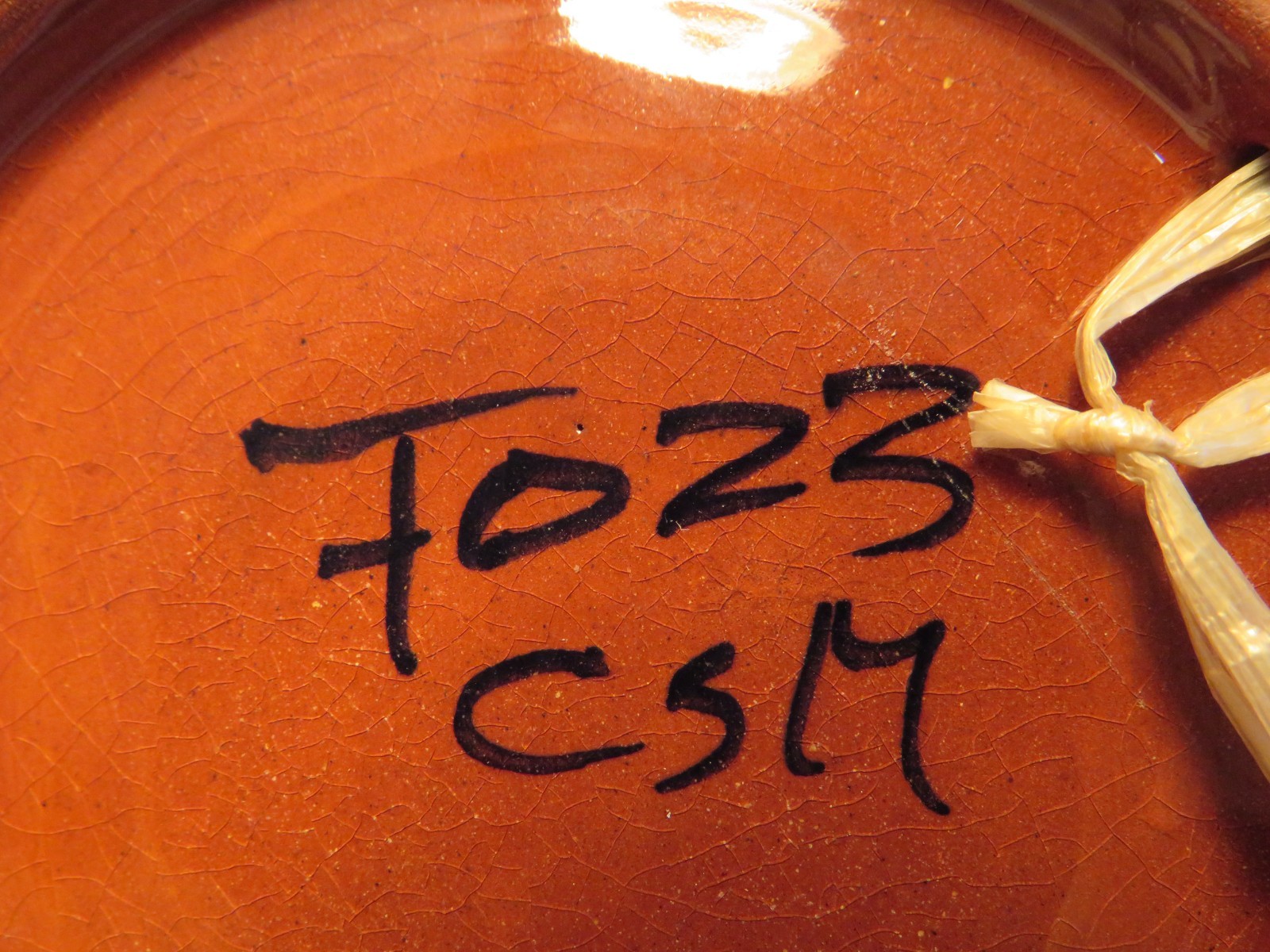 Redware Glazed Wall Hanging Decorative Plate, Signed F023 CSM, 5 and 7/8 in