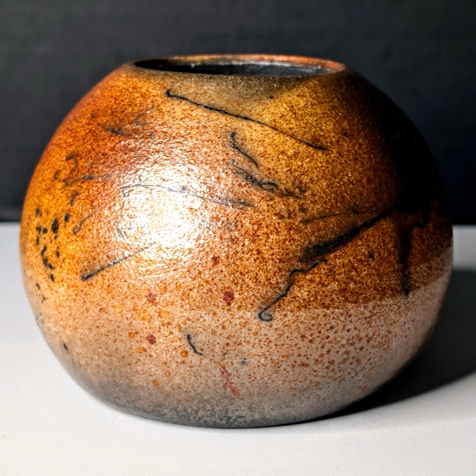 Small Raku Orb Shaped Vessel Metallic Copper Bronze Black Carbon Markings