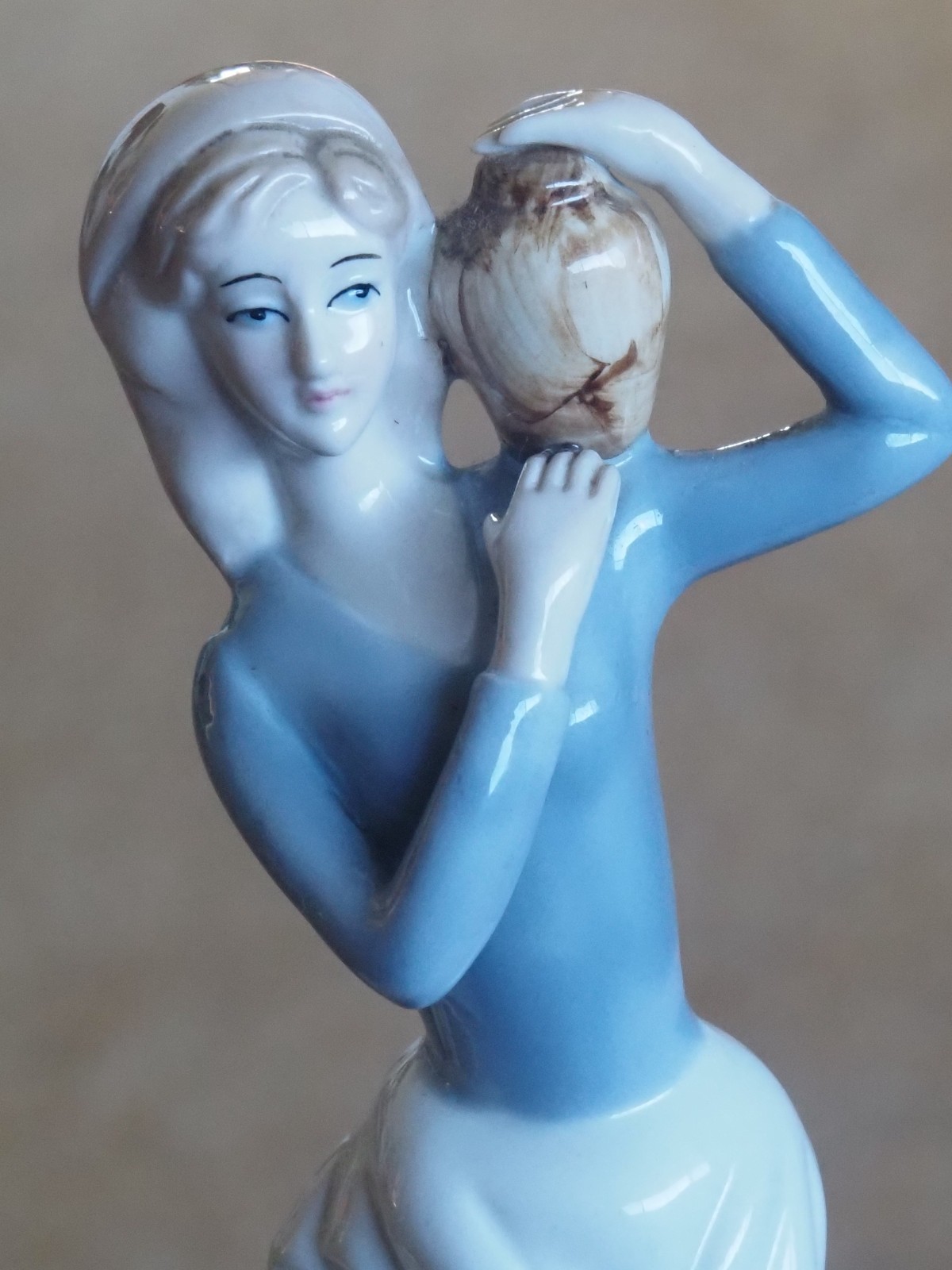 Figurine “Carlotta 1979” Lady with water vessel. 10.5″ Tall.