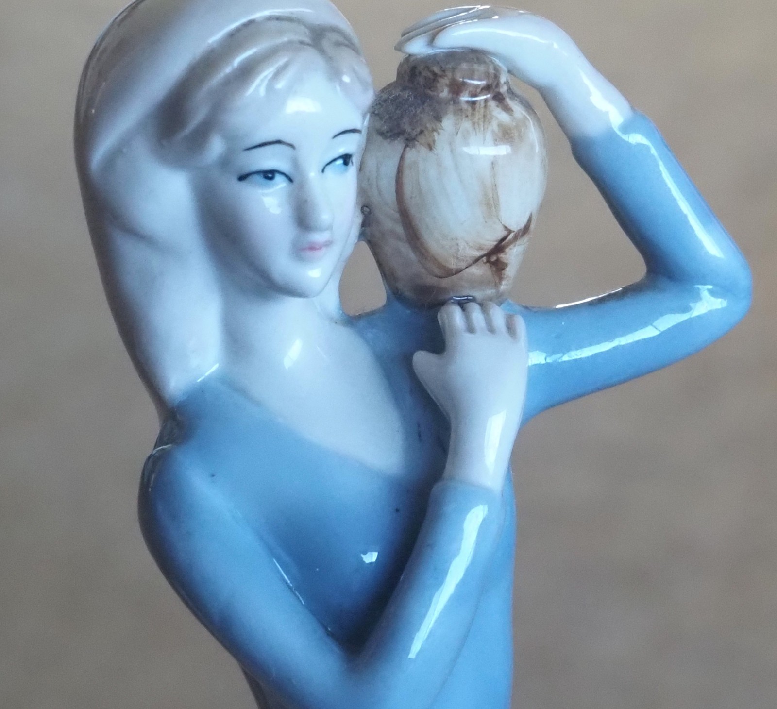 Figurine “Carlotta 1979” Lady with water vessel. 10.5″ Tall.