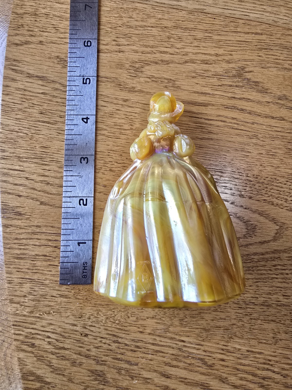 This glass figurine Is A Boyd Art Glass “Marguerite” Colonial Doll.