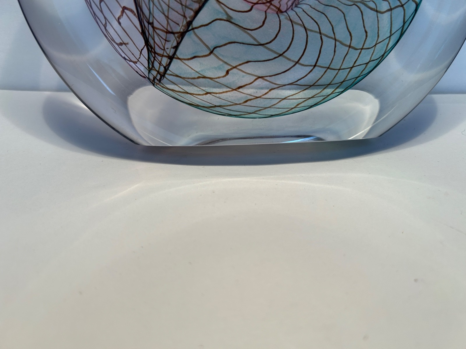 SIGNED ART GLASS FROM THE 1990S WITH PURPLE, GREENS AND LIGHT BROWN VEINING