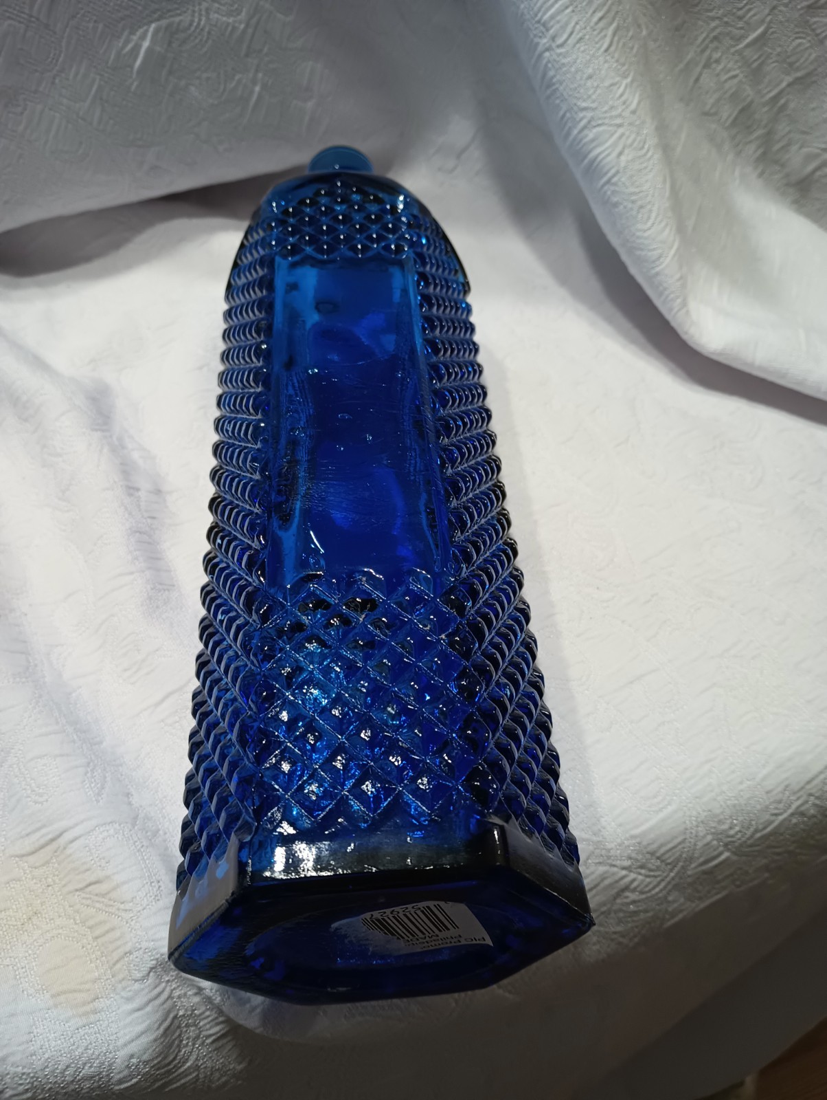 12 1/2″ Cobalt Bottle With Diamond Pattern And Clear Panels Around Center.