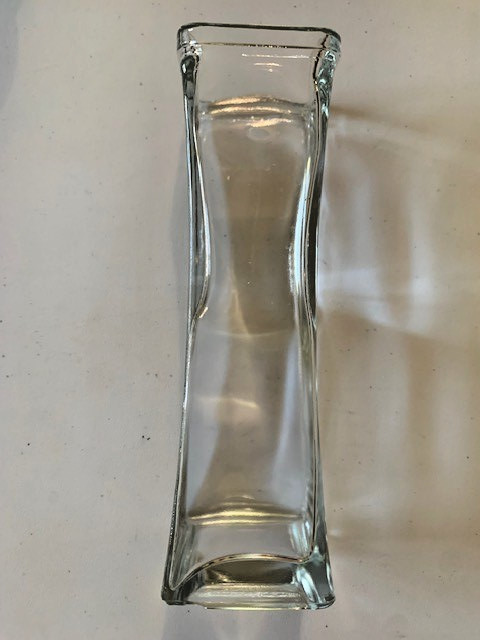 HOURGLASS-SHAPED GLASS BUD VASE 2.25 BASE & TOP 1.75 INCHES IN THE MIDDLE