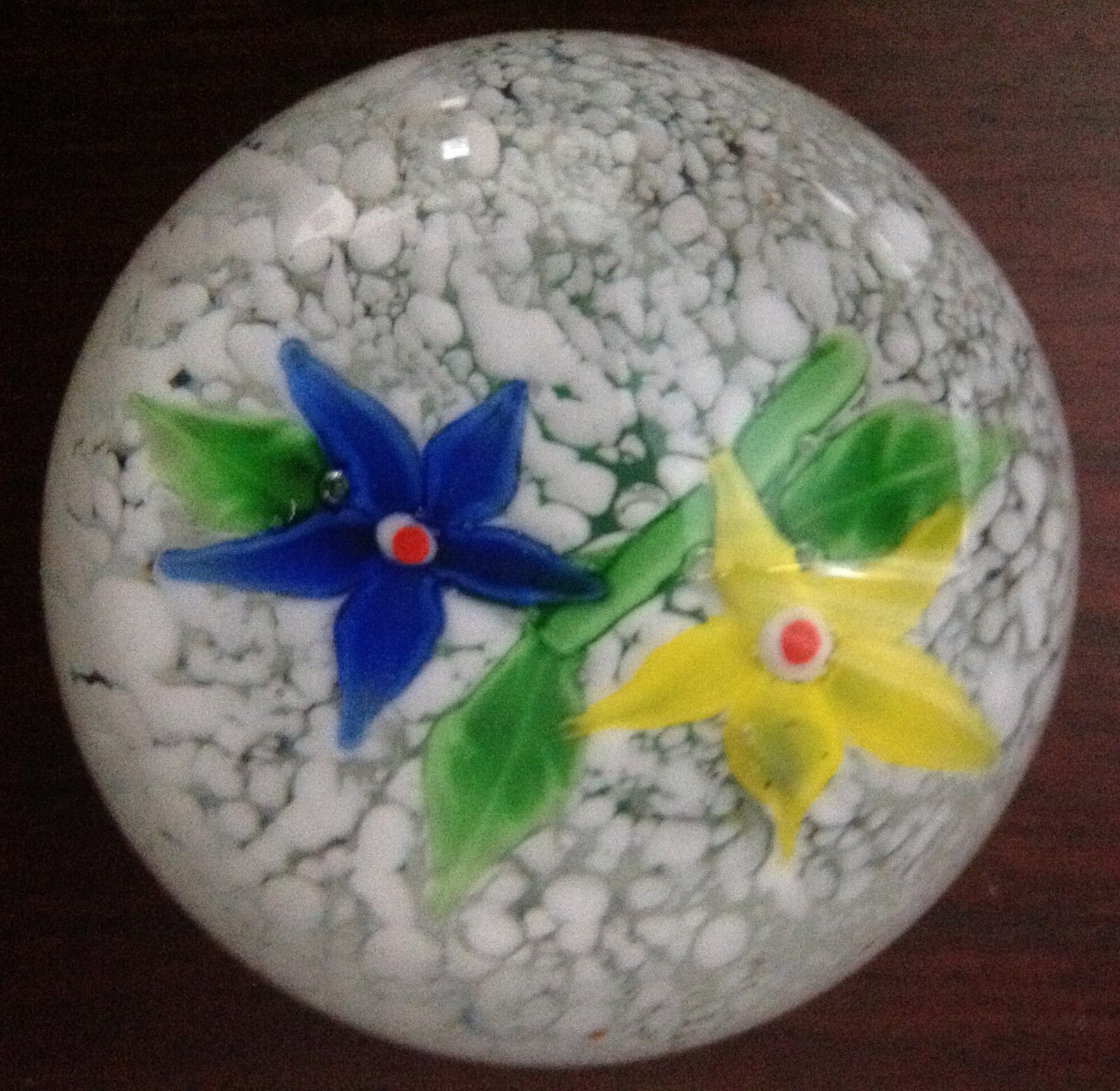 GLASS PAPERWEIGHT – yellow and blue flowers/ white in base – 2.5″ ht + 2.75″ dia