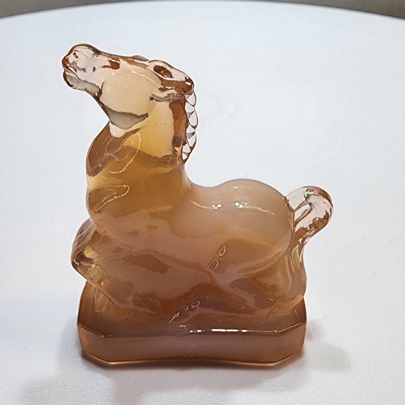 Boyd art glass “Little Joe” miniature figure In Crown Tuscan glass