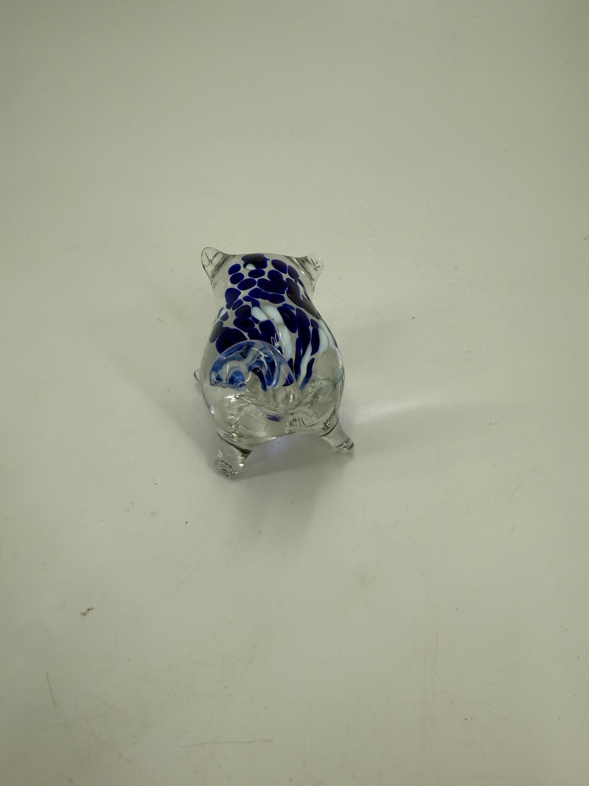 A Blown clear and blue speckled art glass Pig Figurine