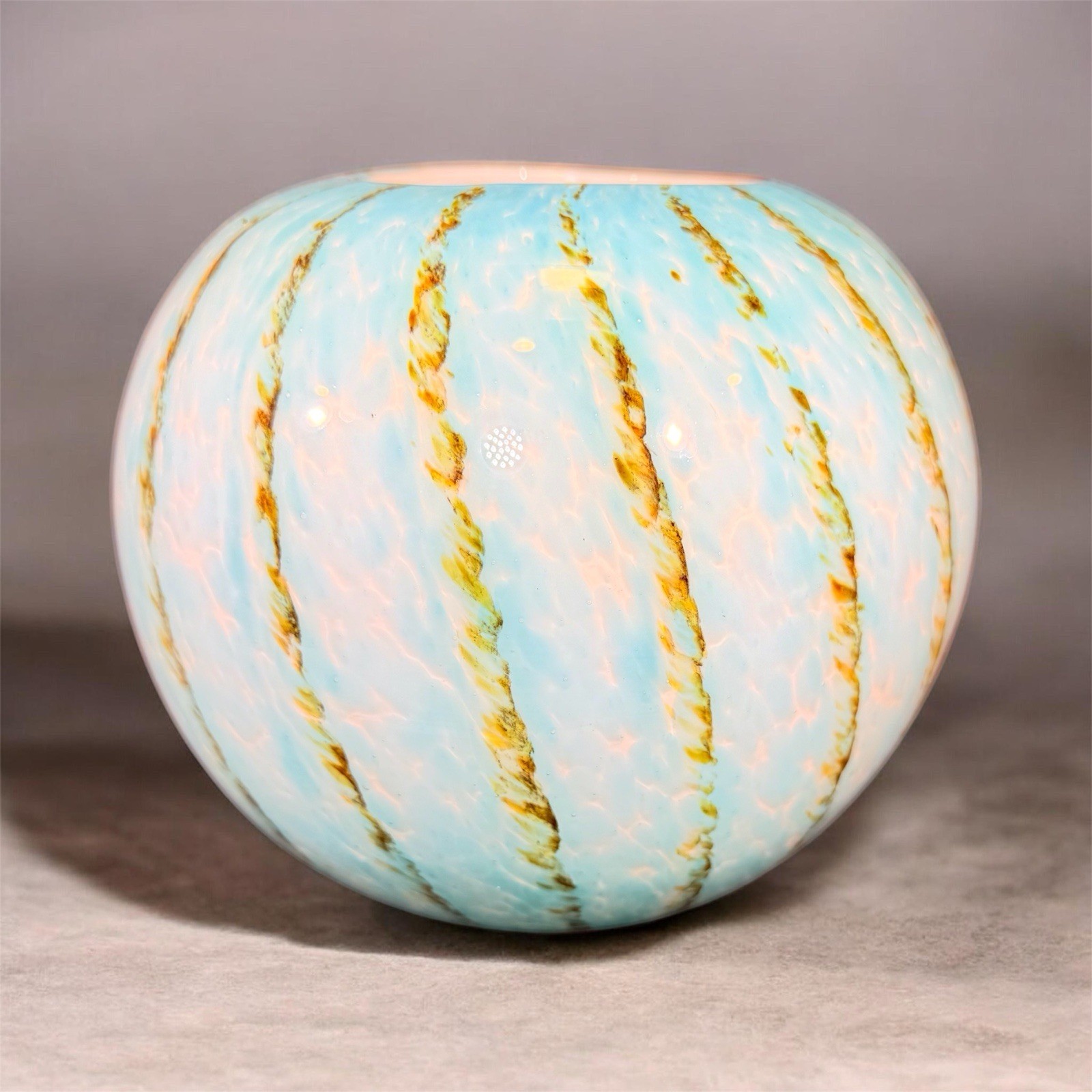 vase with aqua blue and opalescent swirl pattern with gold aventurine stripes