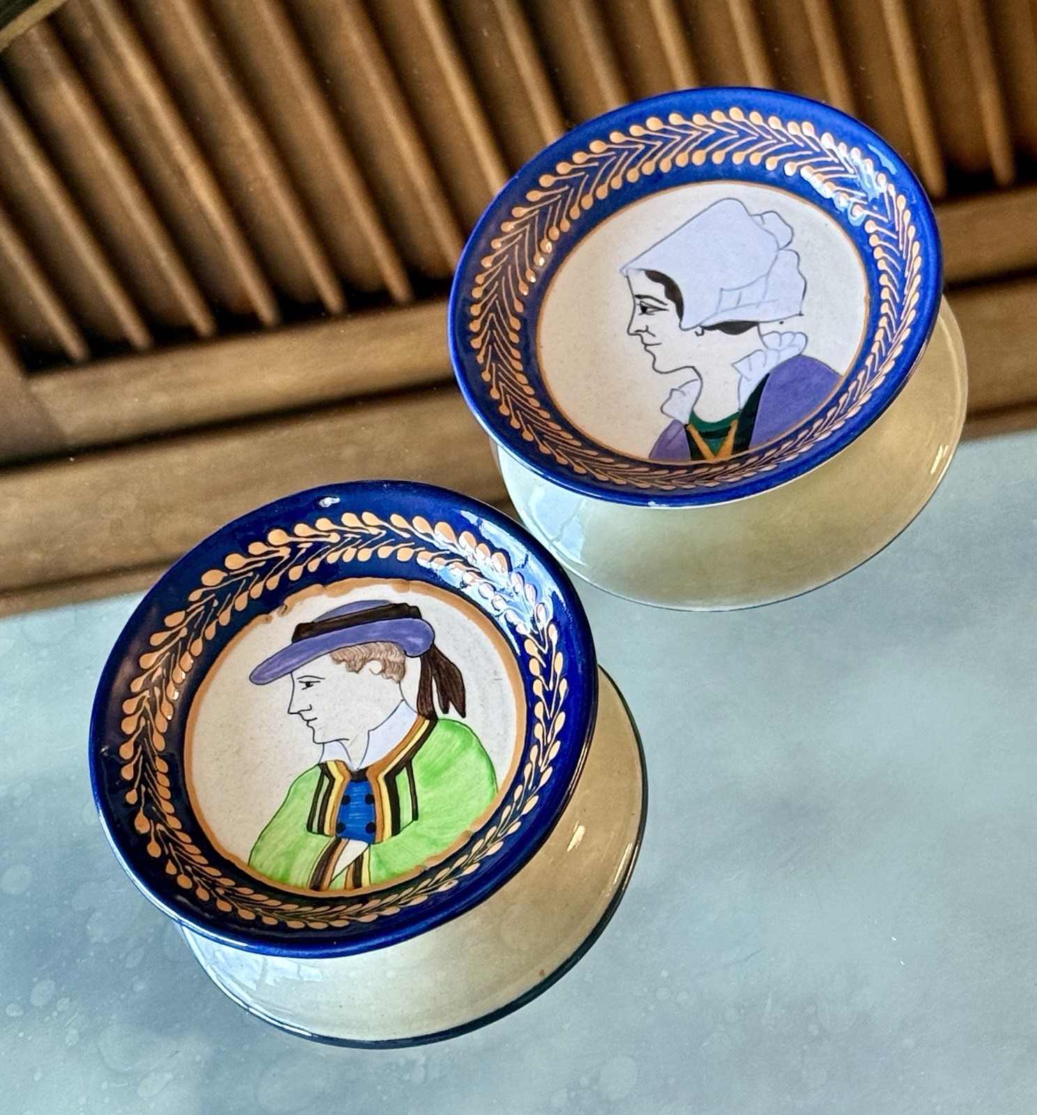 Two Hand-Painted Quimper Breton Faience Portrait Plates Circa 1930. Signed HB.