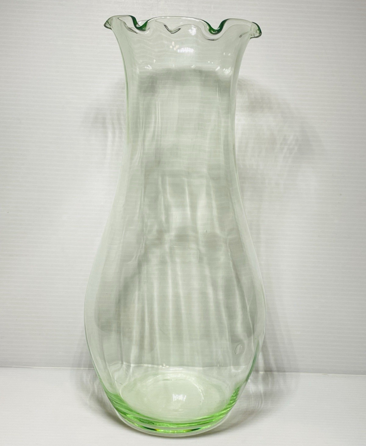 Vintage Green Uranium 12″Glass Vase Ruffled Rim faint vertical optic lines.