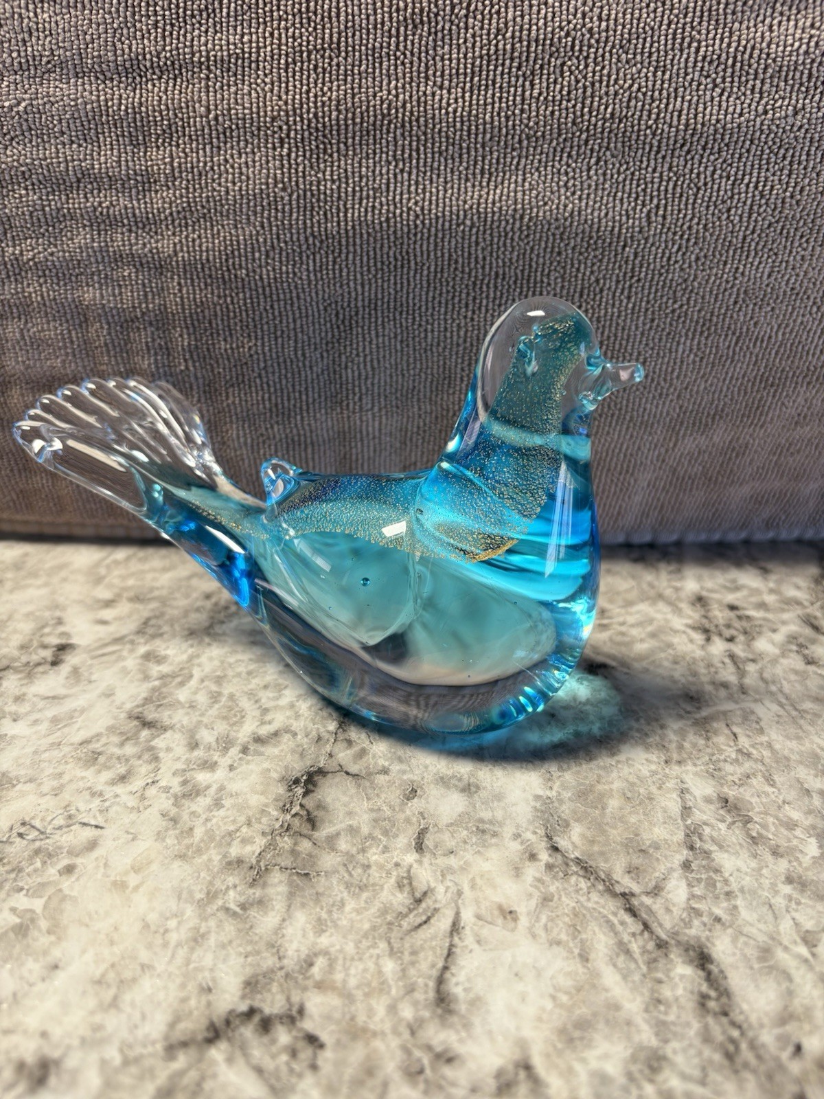 Clear and blue glass bird figure with gold flakes inside #B11