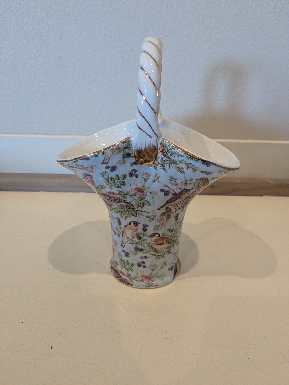 Bird Chintz Collection Ceramic Basket Bird Floral Twisted Handle and Gold Trim.