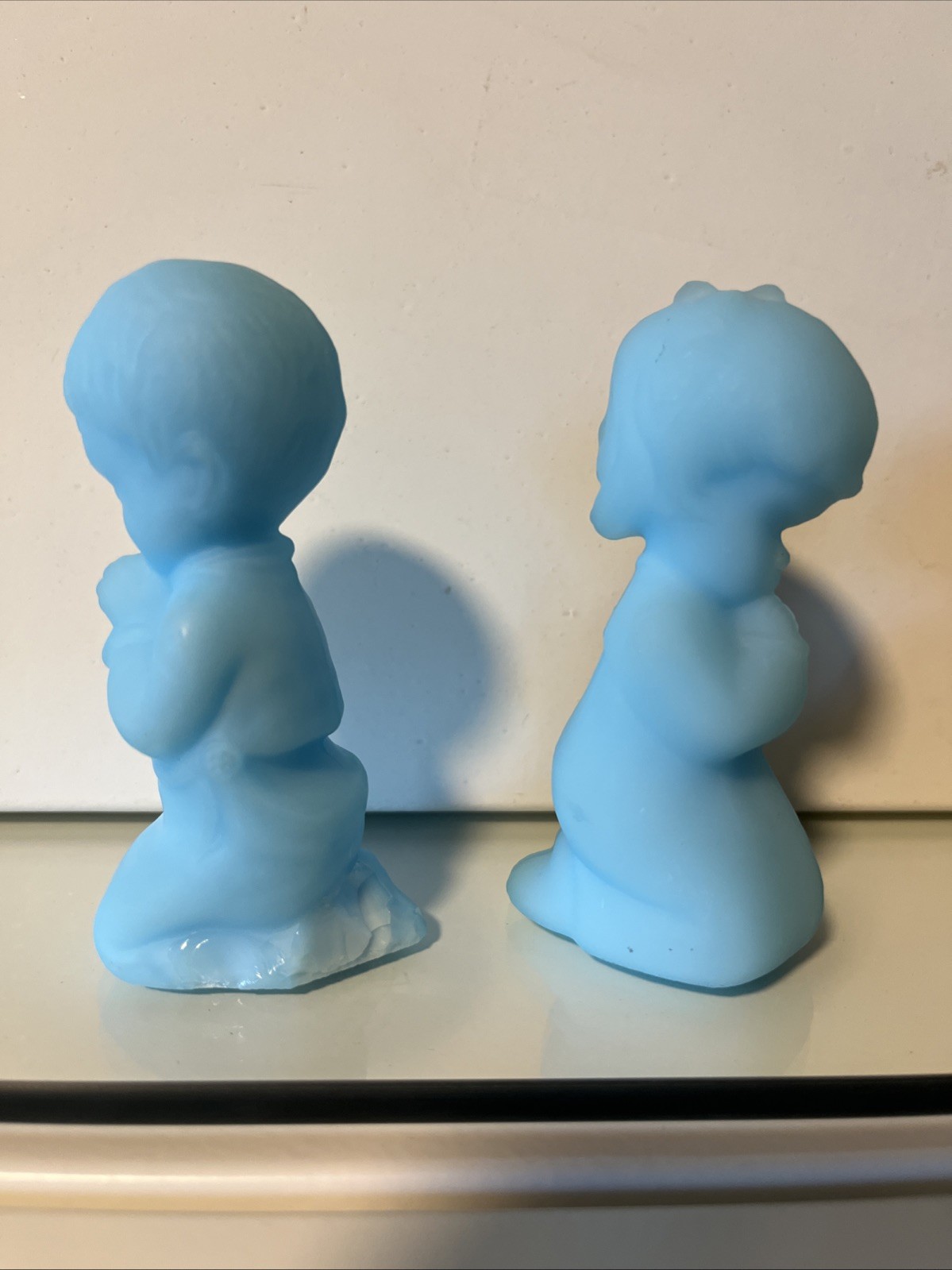 Set of 2 Fenton Blue Satin Custard Glass Praying Boy and Girl. Damaged