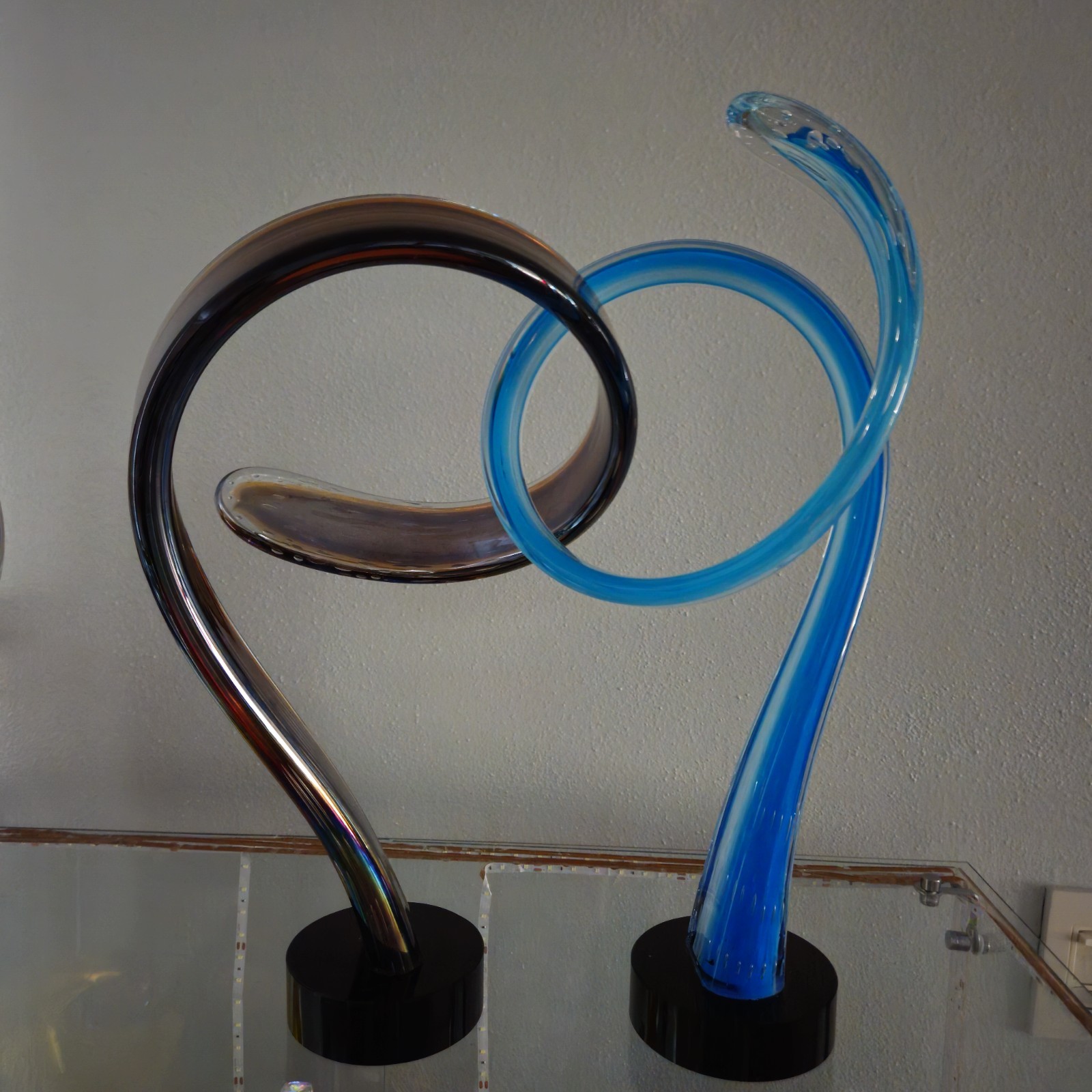 Intertwining glass sculpture