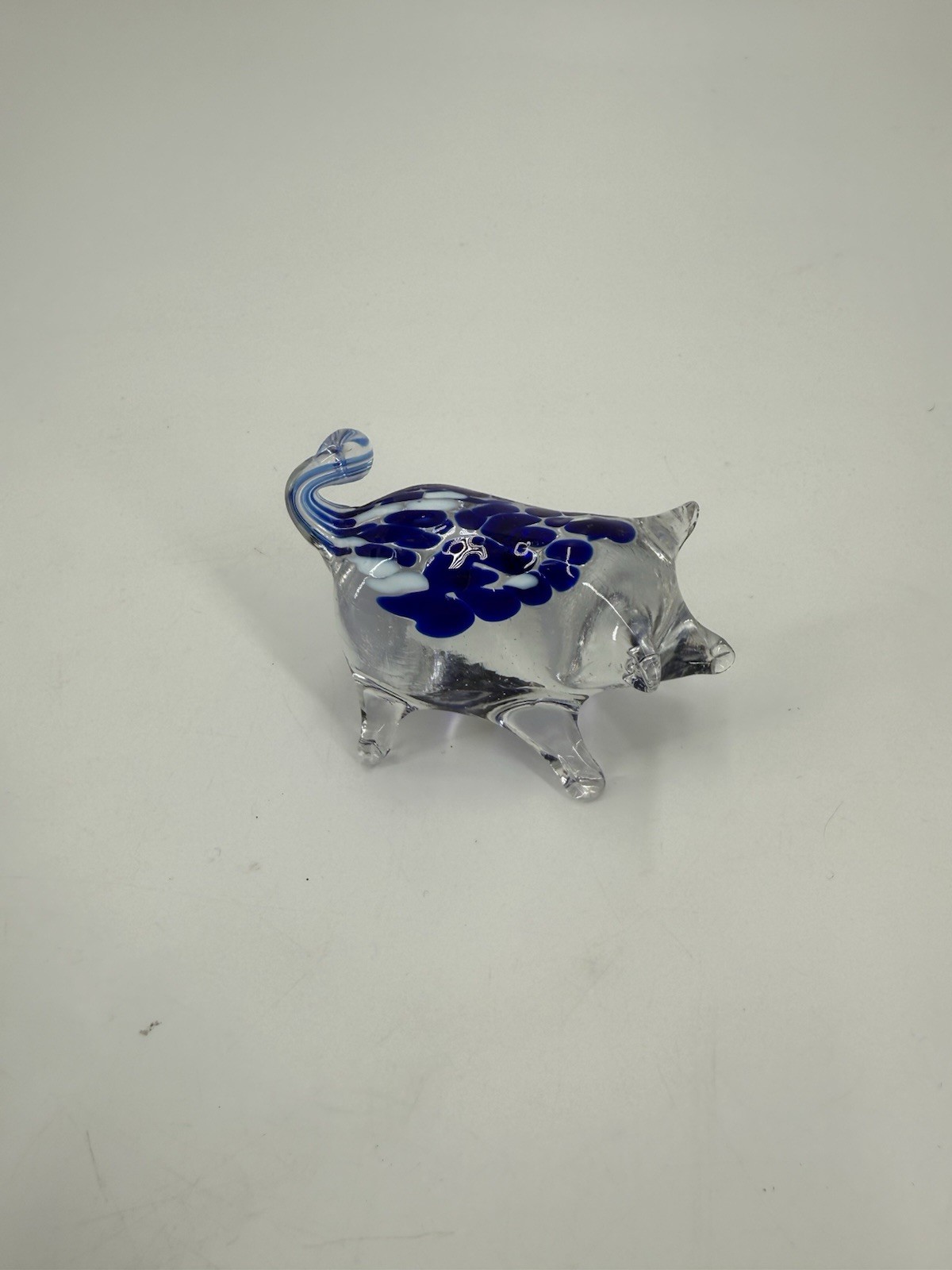 A Blown clear and blue speckled art glass Pig Figurine