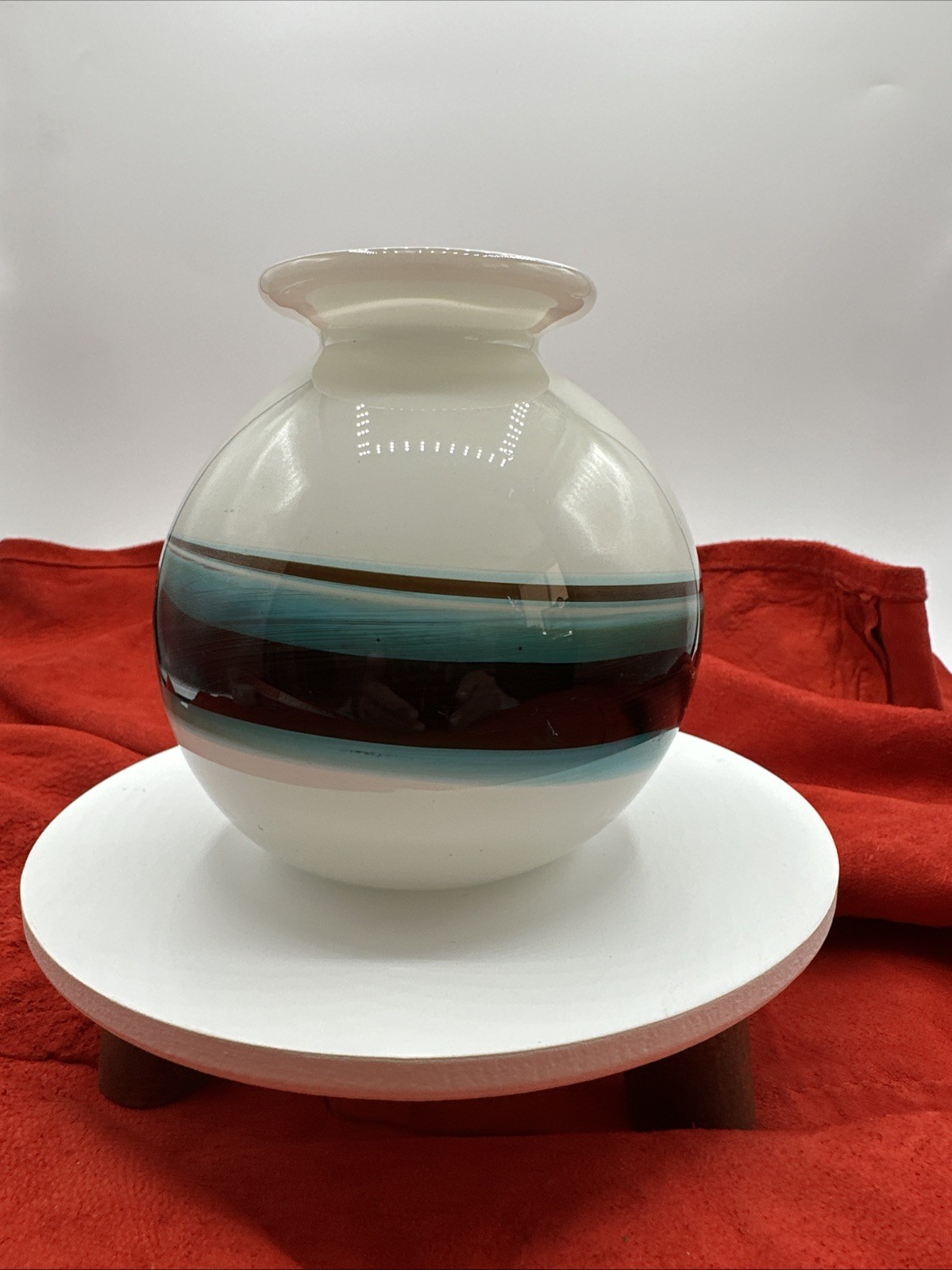 ‘76 Daniel Edler Art Glass Studio Vase. 4.5” tall/ 14” circumference. A2/6.