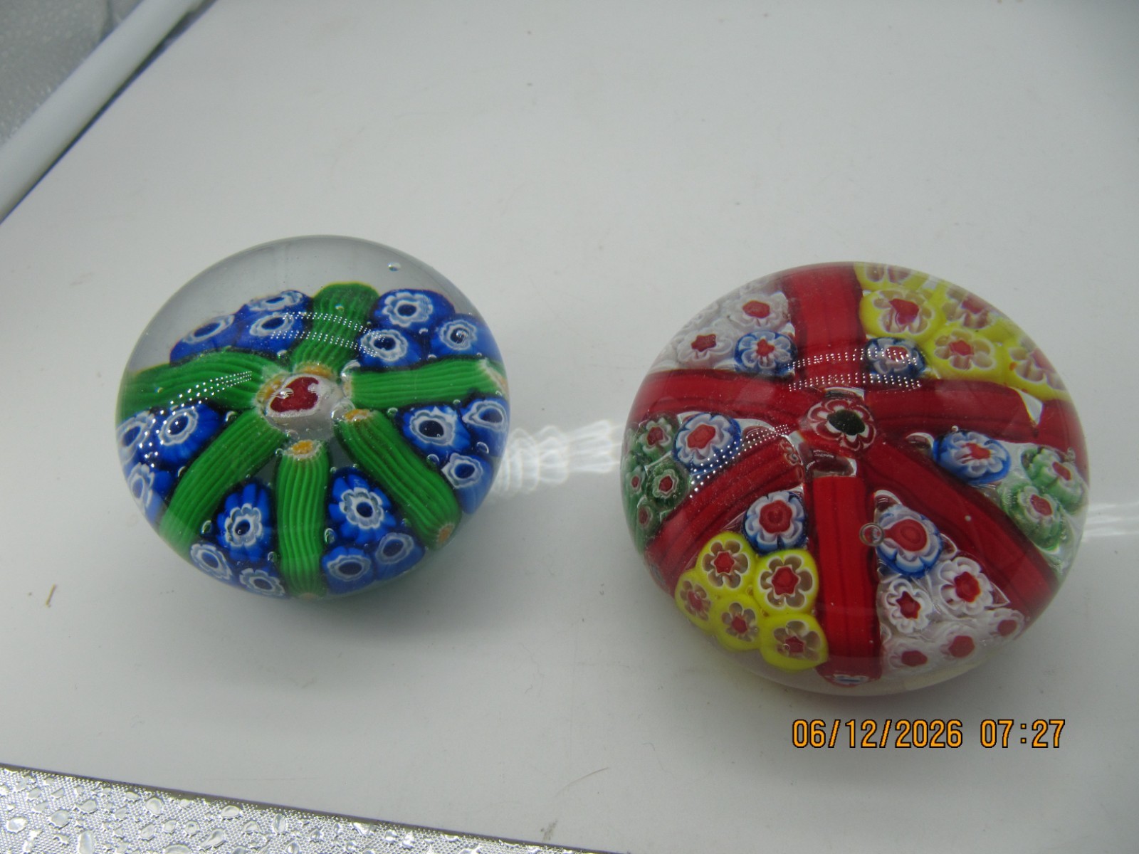 2 Paperweights Multicolored green and redFlower Spoke