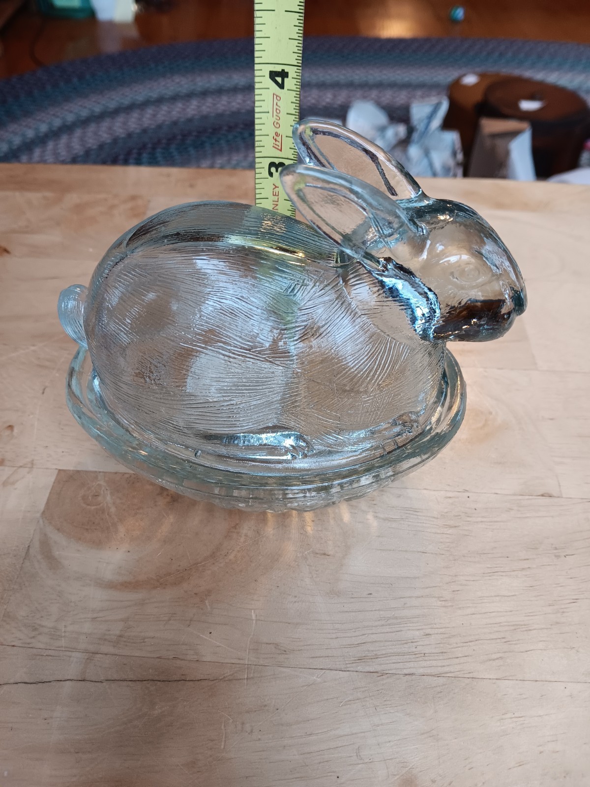SMALL GLASS BUNNY ON A NEST. 1179