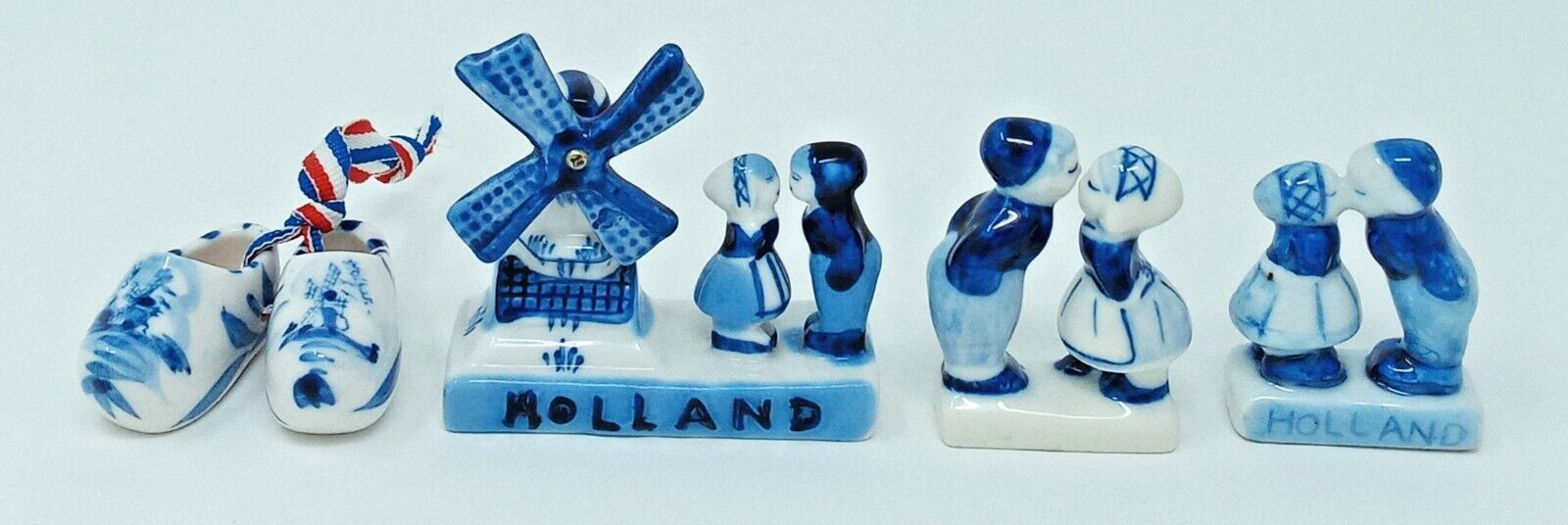 Assortment of Holland small Delft Blue Theme Items clogs kissing couple windmill