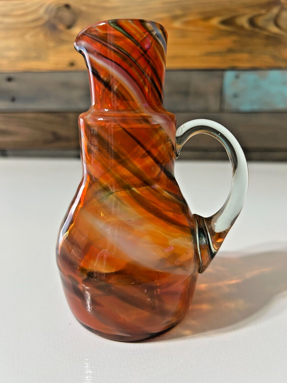 Blown Glass Small Pitcher Orange, Green and Amber Swirl 5.5 ” tall
