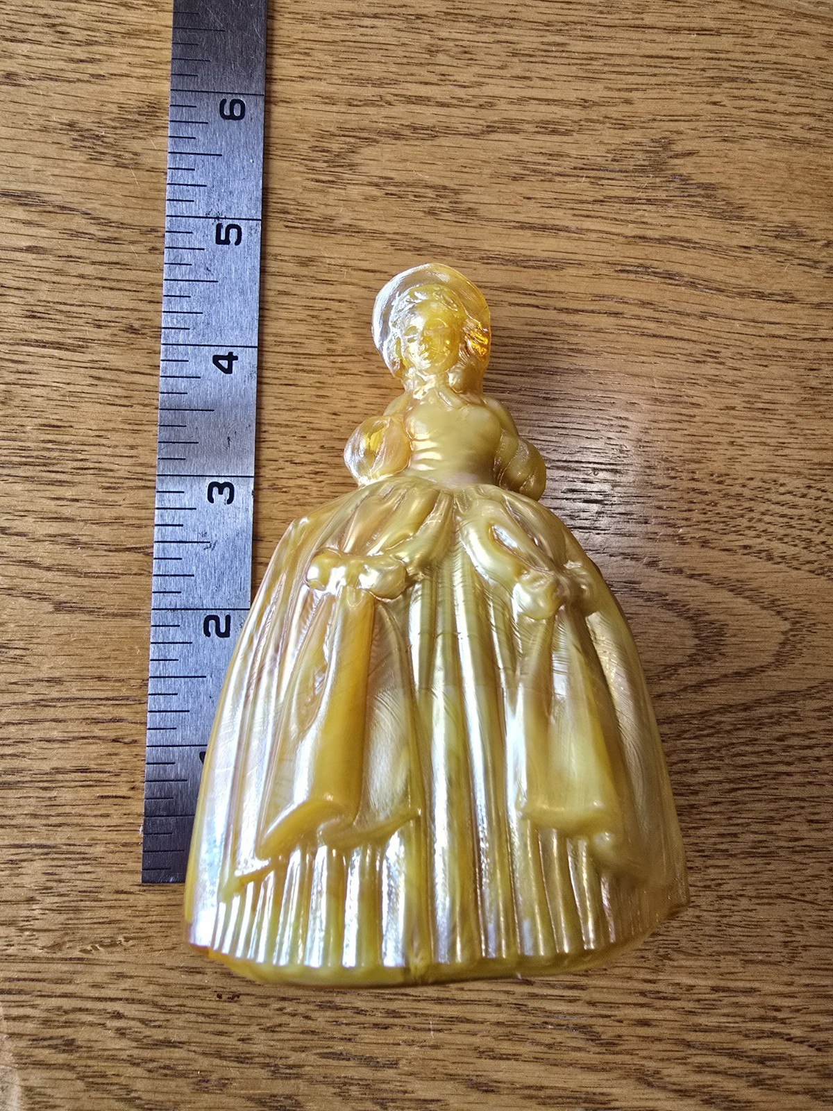This glass figurine Is A Boyd Art Glass “Marguerite” Colonial Doll.