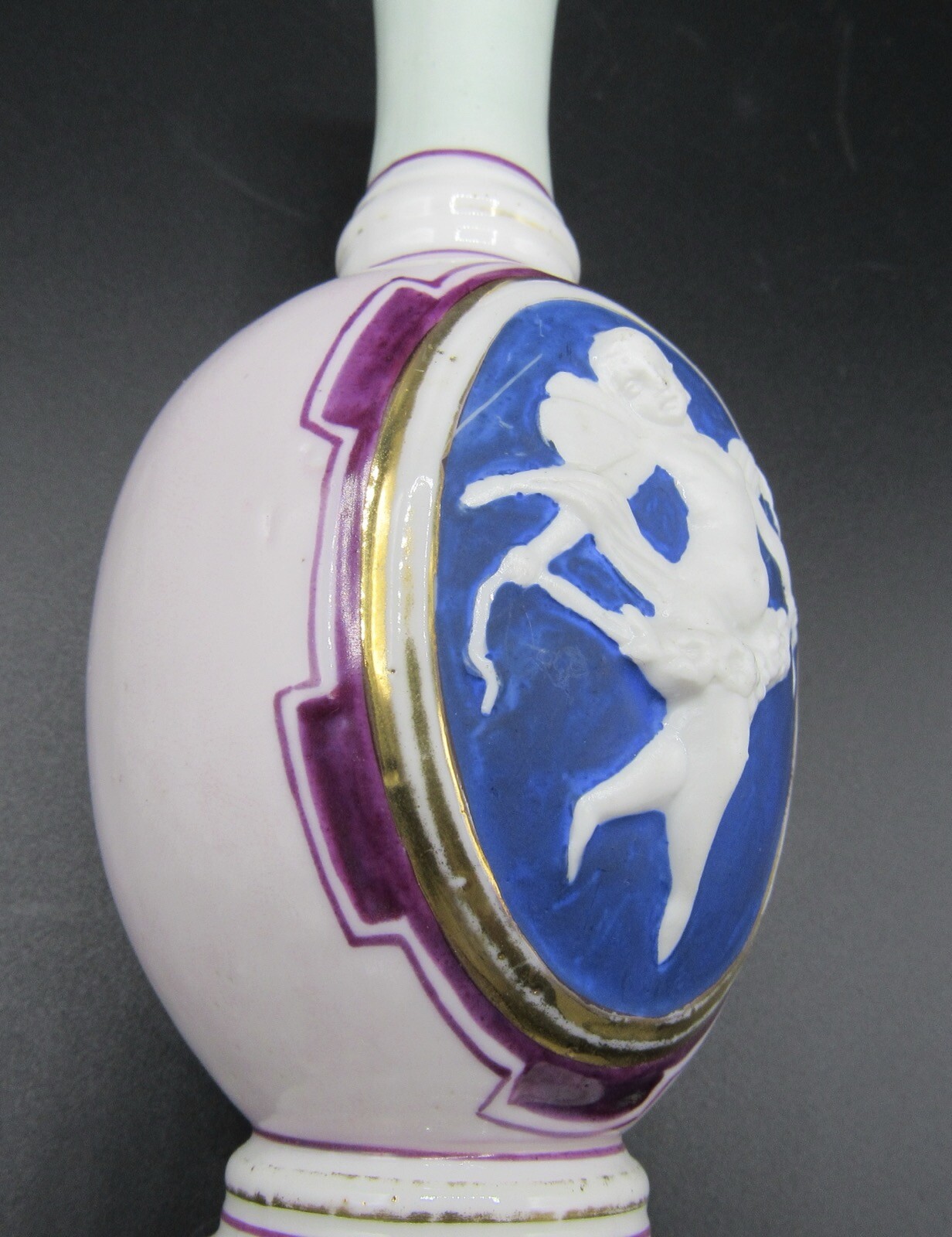 Antique porcelain vase cupid arrow/putti 6.75″