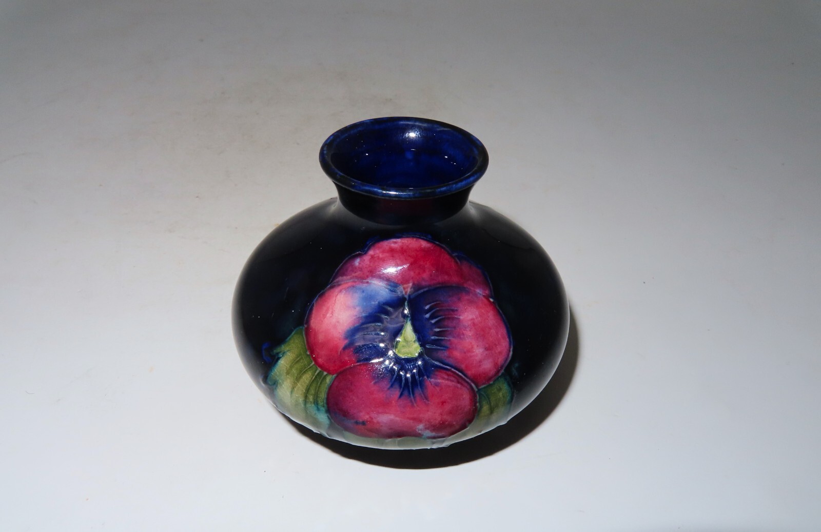 Moorcroft Pottery – 1920’s Pansy Footed Vase 2 3/4″ inches in Height