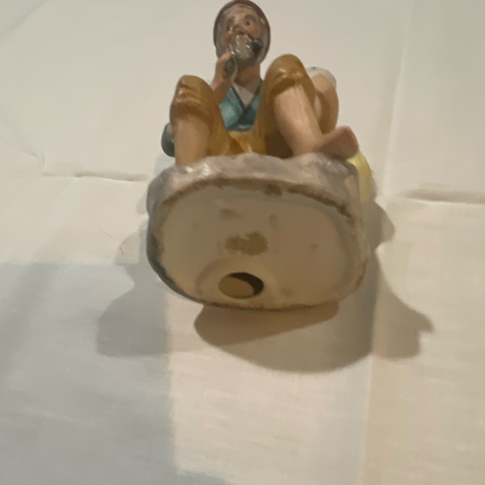 Ceramic Multicolor Glossy Decorative Figurine of Man with Jug People Theme