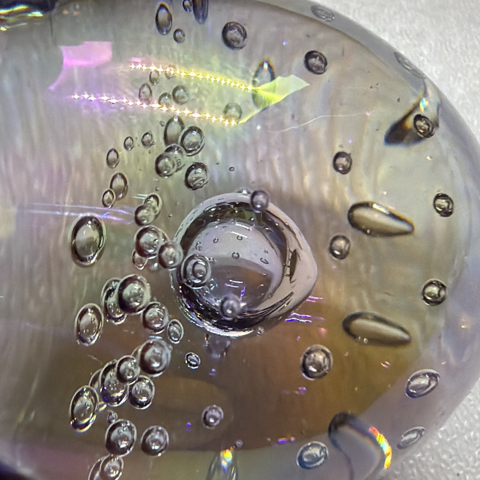 1997 Glass Eye Studio Egg Form Glass Paperweight w Swirl & Iridescent Decoration