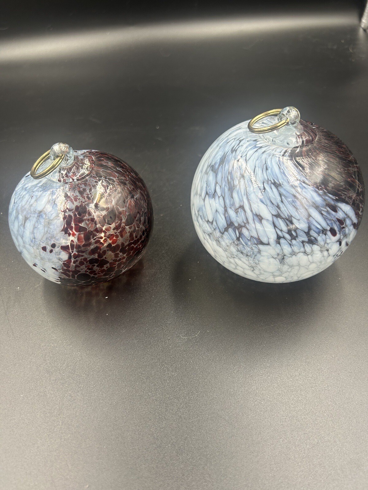 Hand Blown Glass Hanging Balls 4” And 3” In Diameter With Hanging Rings.