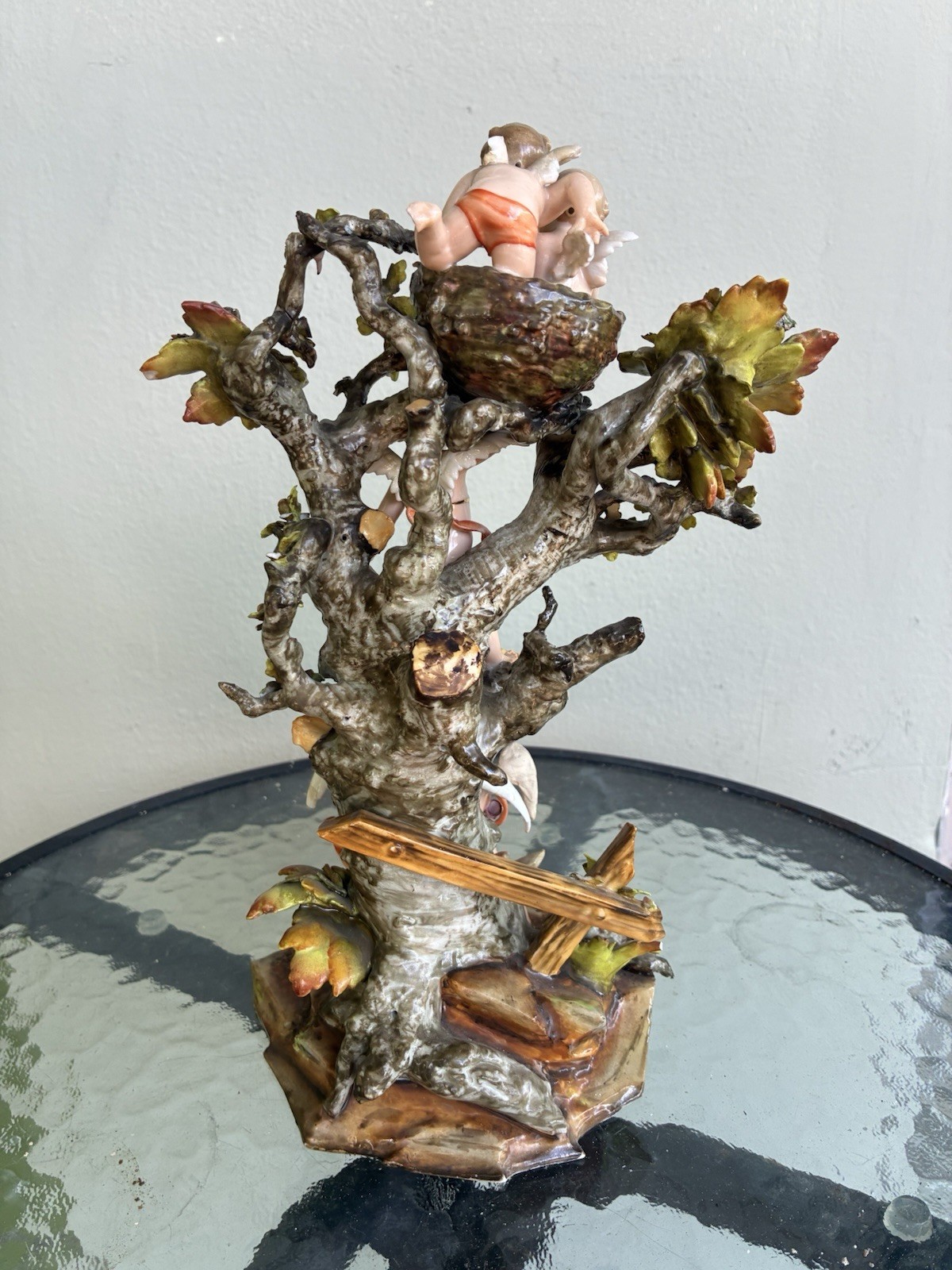 Volkstedt cherubs dancing in a tree and birds nest. 10” tall